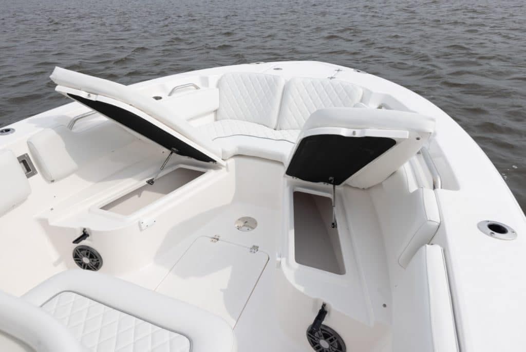 Manufacturer Provided Image: 2025 Sea Fox 248 Commander boat with open storage compartments on calm water.
