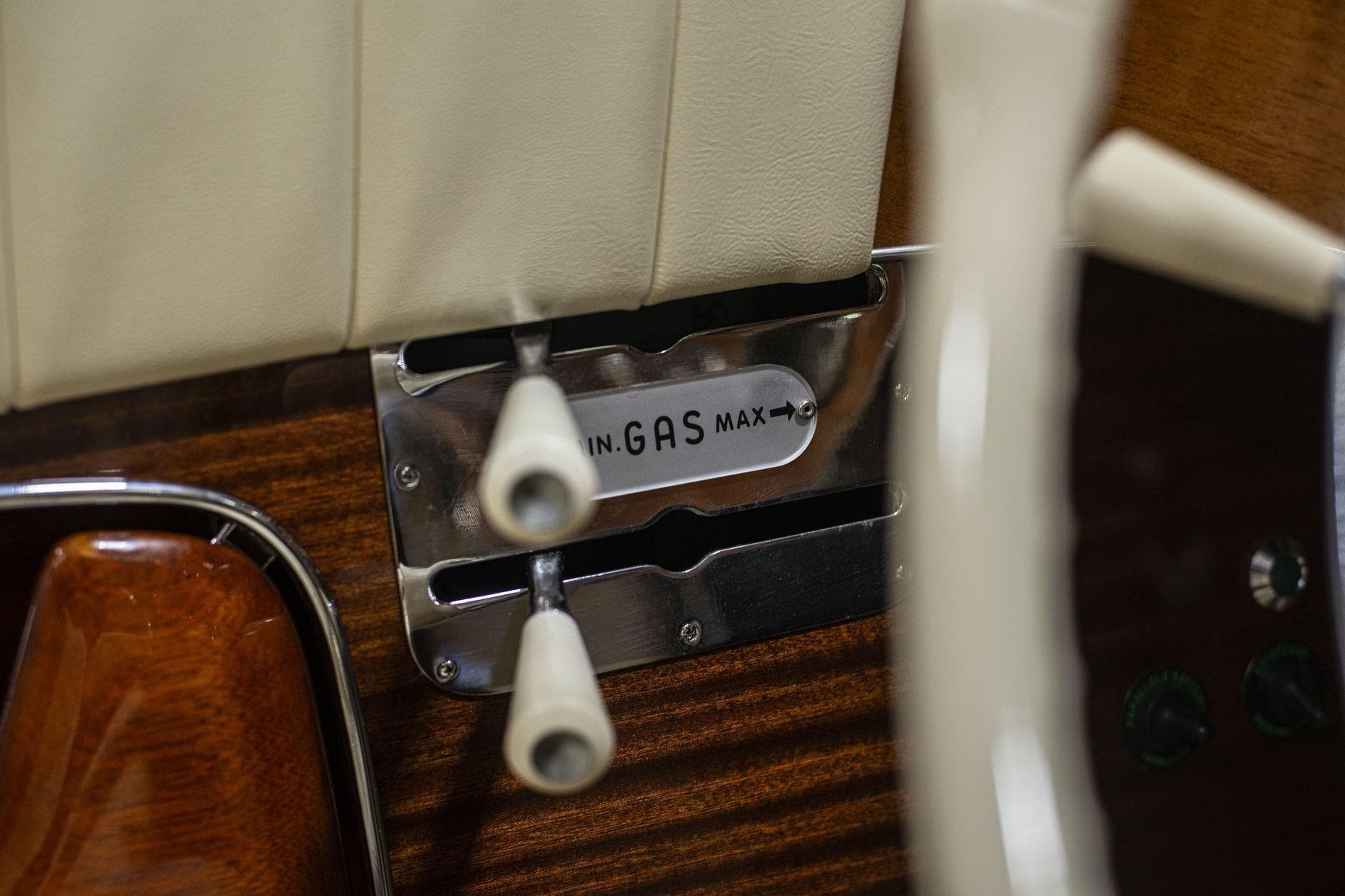 1971 Riva Super Aquarama throttle controls with wood and chrome details.
