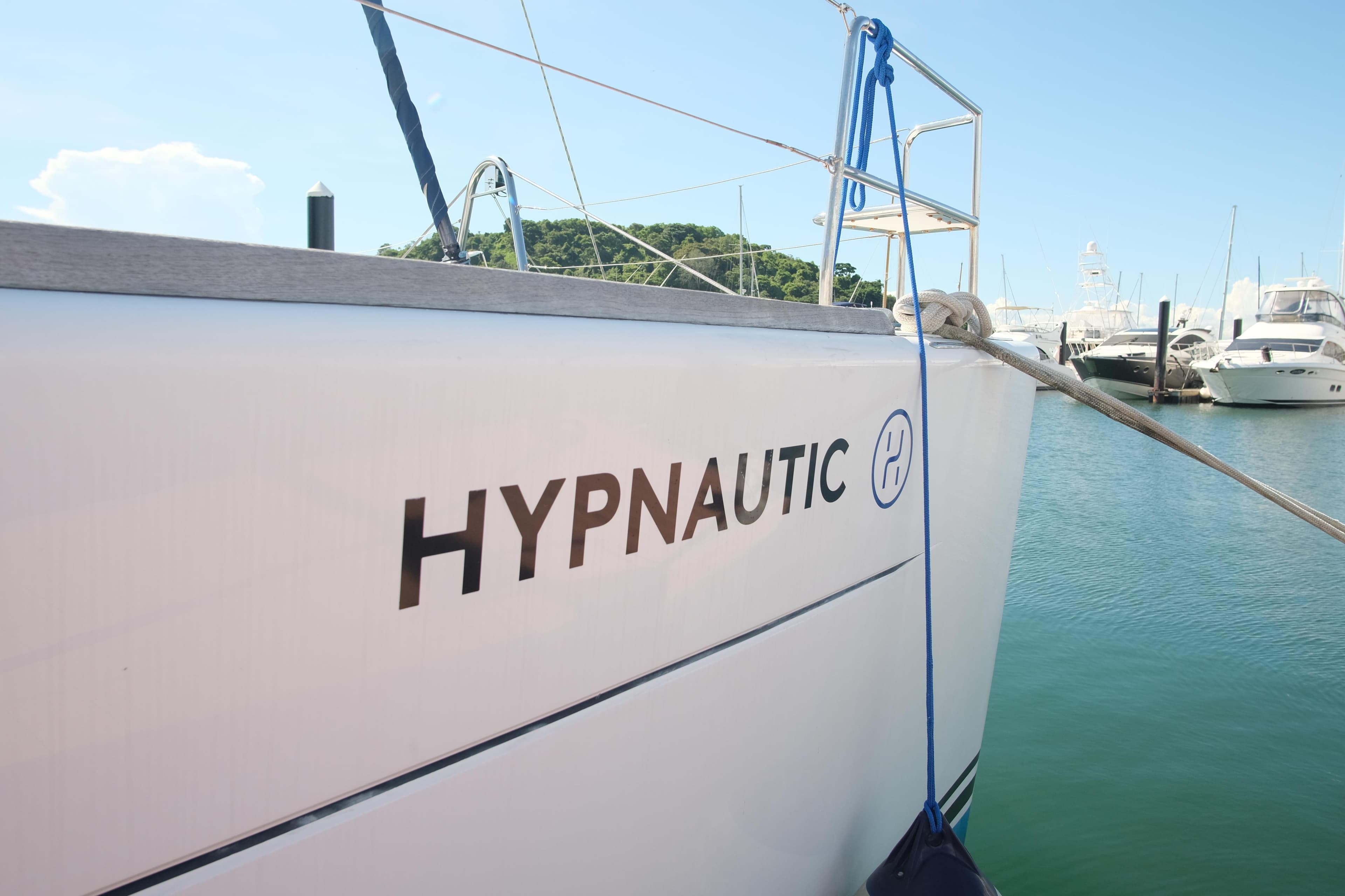 Lagoon 440 catamaran named "Hypnautic" docked in a marina, 2002 model.