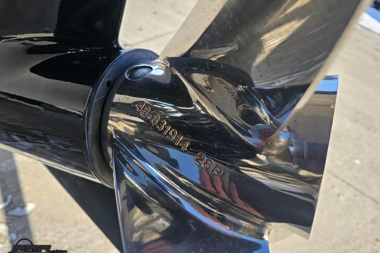 Close-up of a polished propeller blade on a 2025 Concept 27' CC boat.
