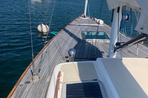 2005 Morris M36 Daysailer on calm water, showcasing deck and rigging details.