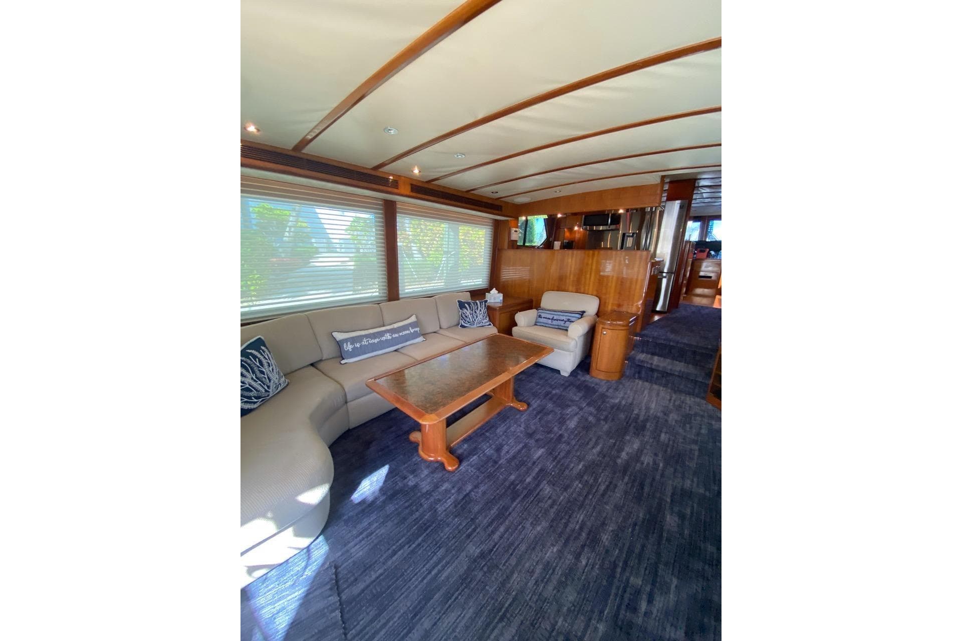 Luxurious interior of 2006 North Star Yachts 73 Cockpit Motoryacht with elegant seating and wood finishes.
