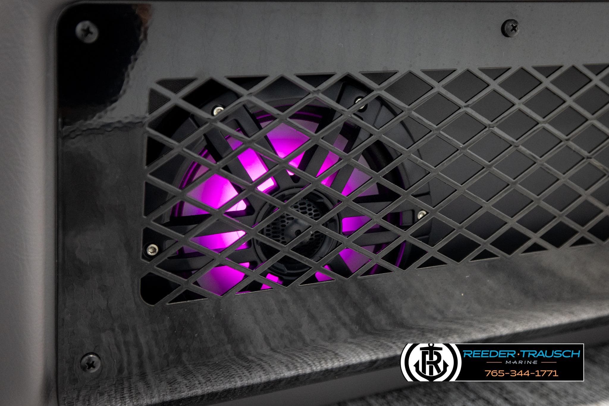Illuminated speaker with purple light on 2026 Bennington 22 MFBSE boat.
