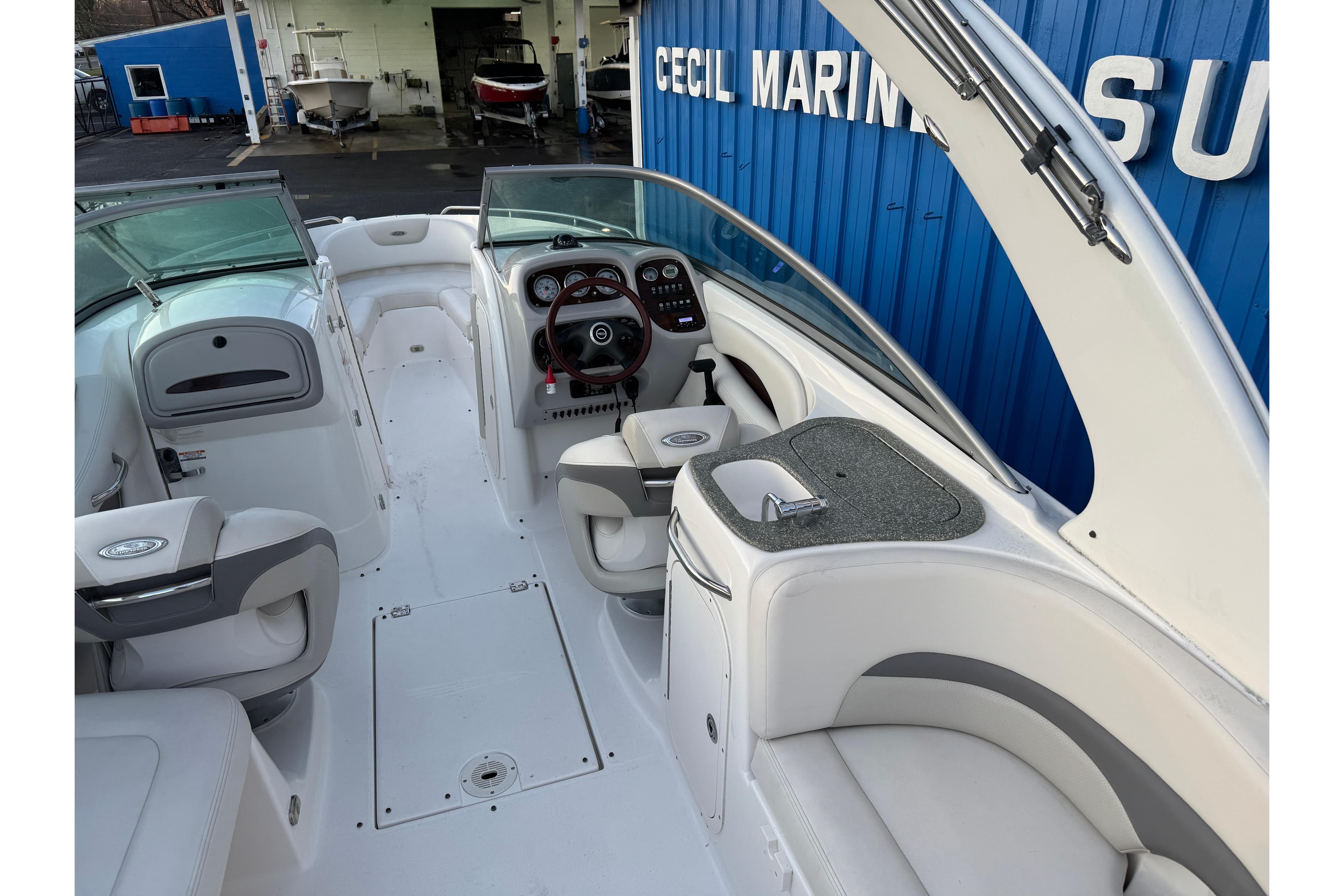 2007 Chaparral 256 SSi boat interior with steering wheel and seating.