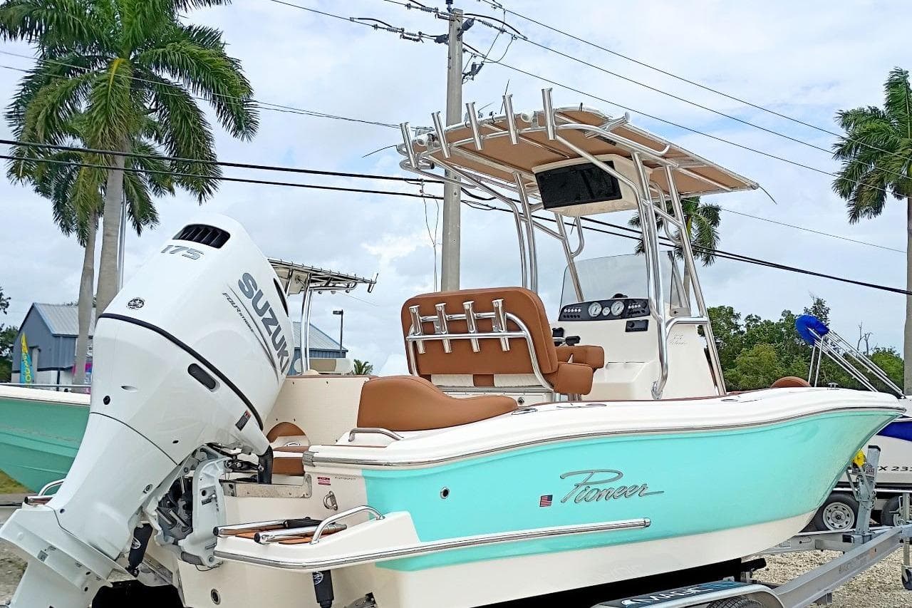 2027 Pioneer 202 Islander boat with Suzuki engine, tropical setting.