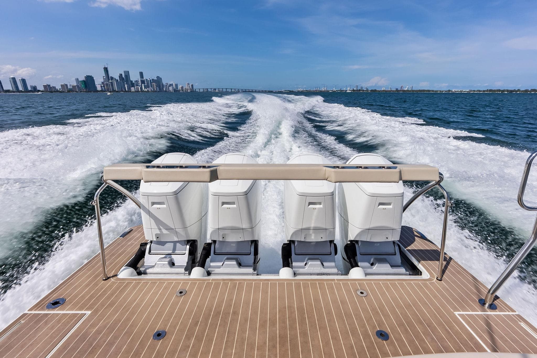 2025 Formula 500 Super Sport Crossover cruising with city skyline in the background.