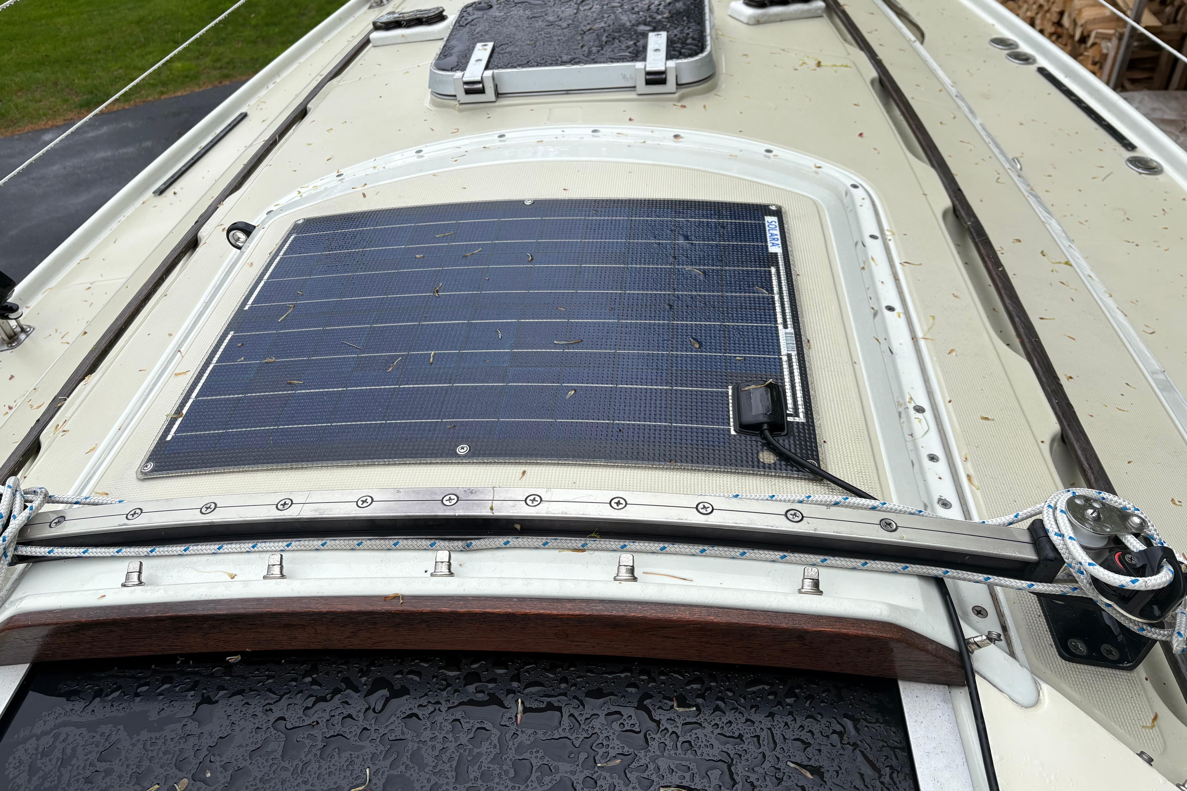 1987 Ericson 28/2 sailboat with solar panel installed on deck.