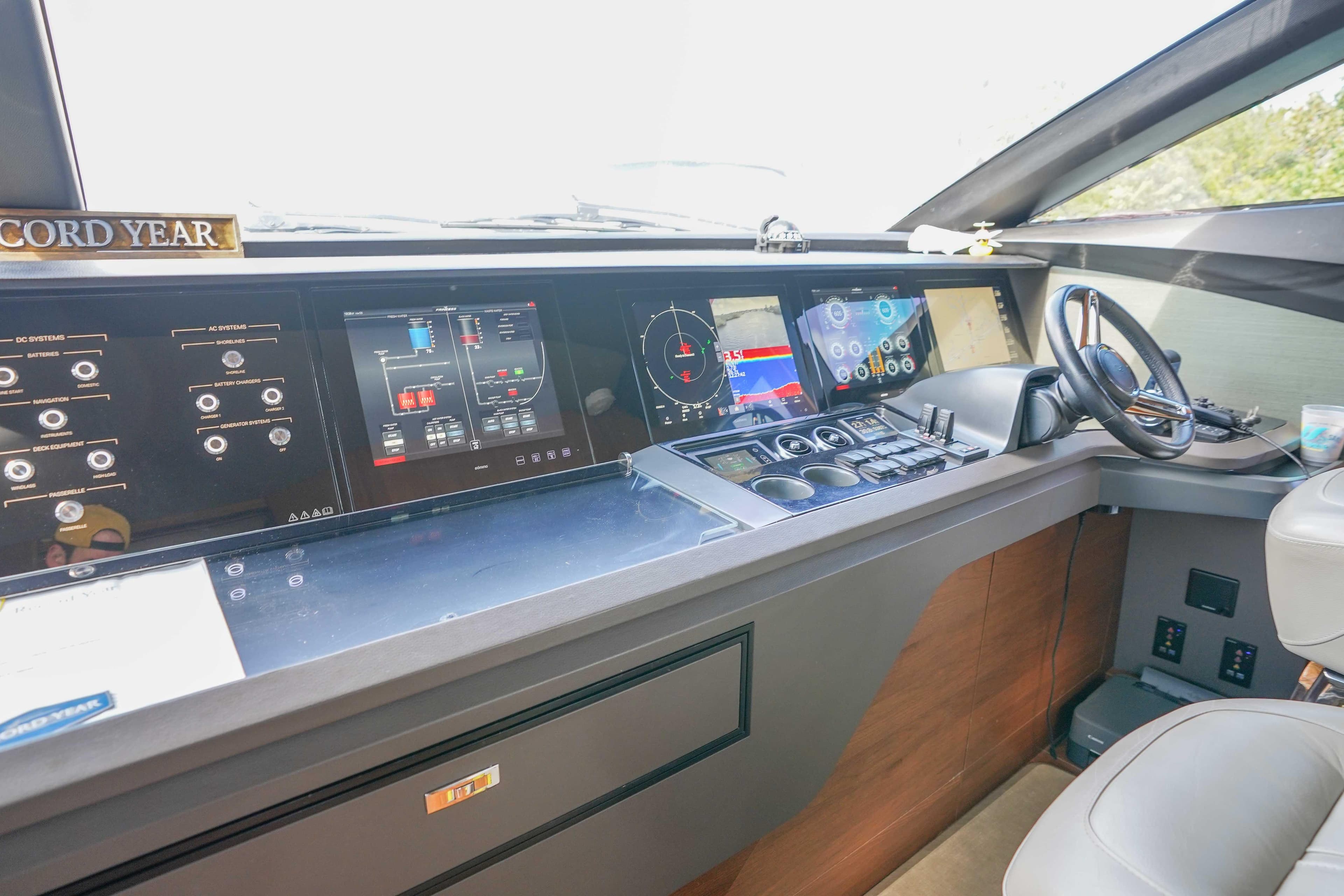 Cockpit of 2021 Princess Y85 yacht with advanced navigation and control systems.