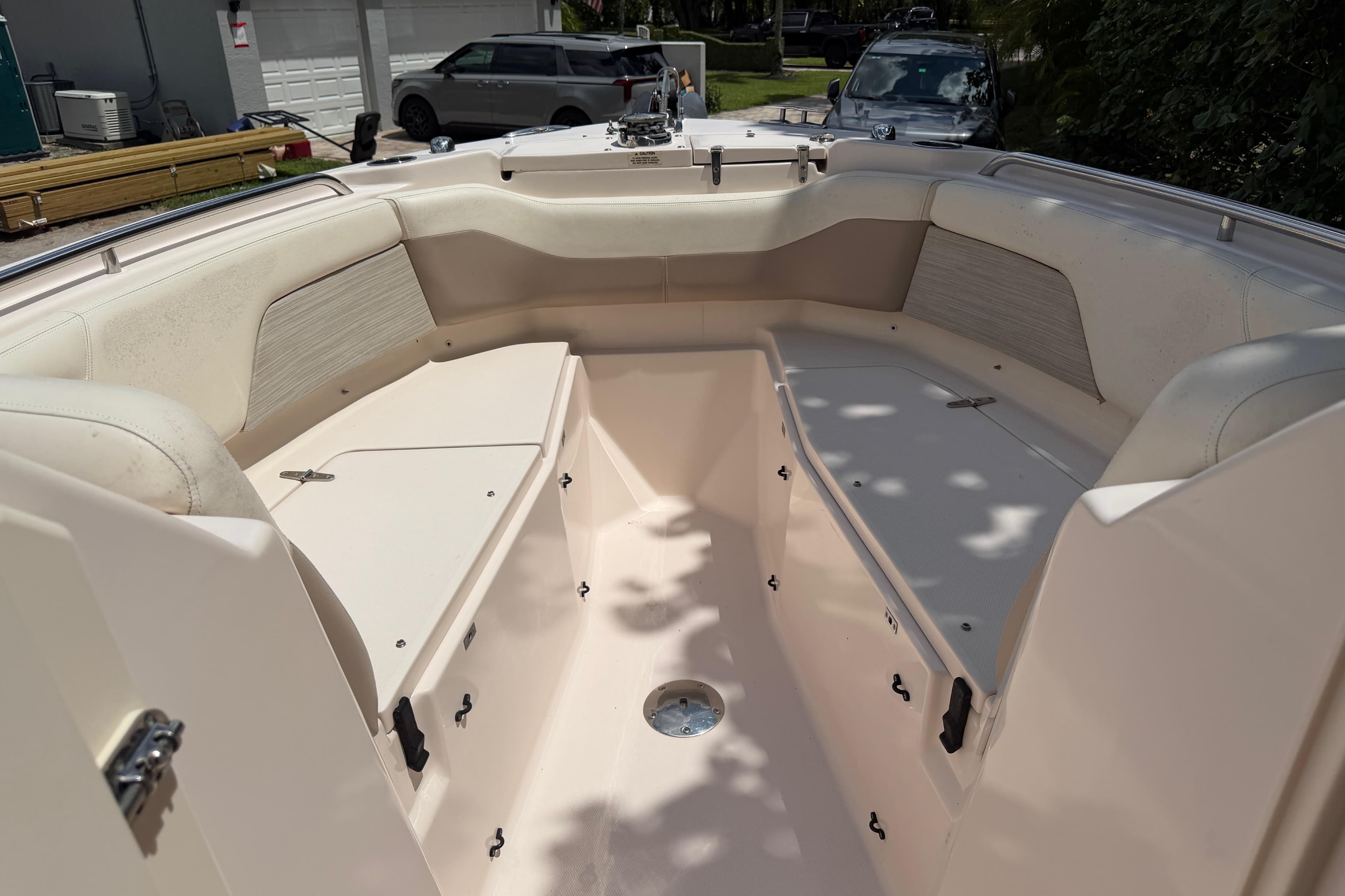 2014 Grady-White Freedom 275 boat interior with spacious seating and storage compartments.