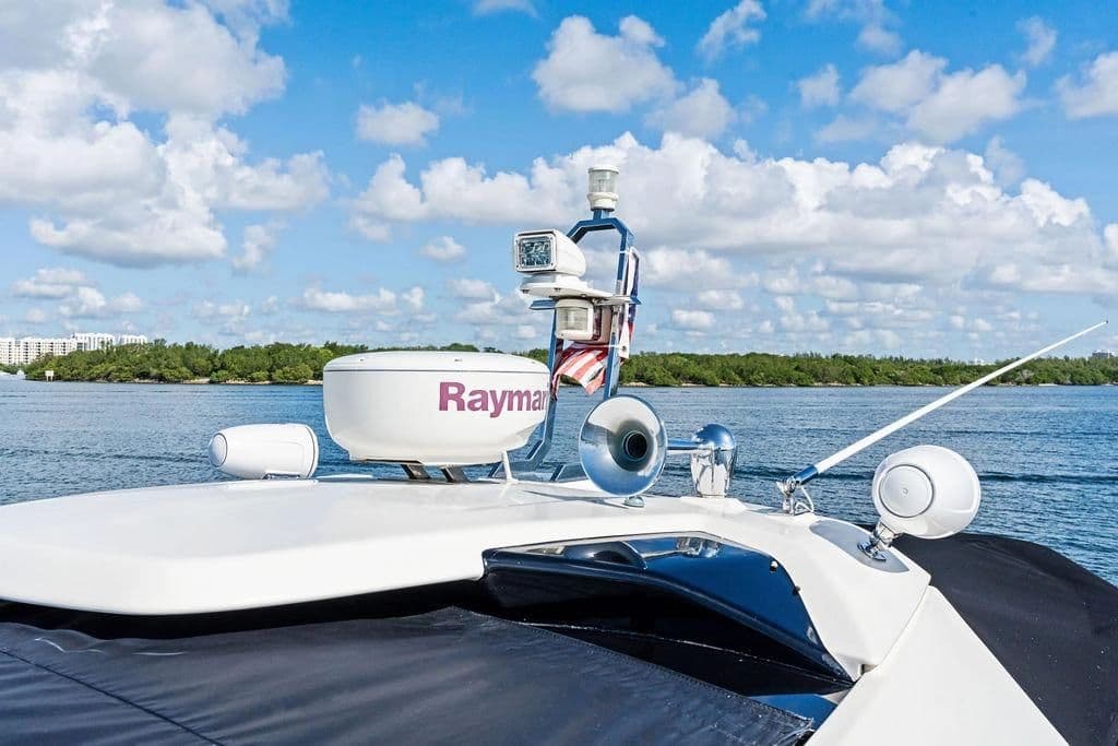 Azimut Atlantis 48 Yacht 2013 on calm water with blue sky.