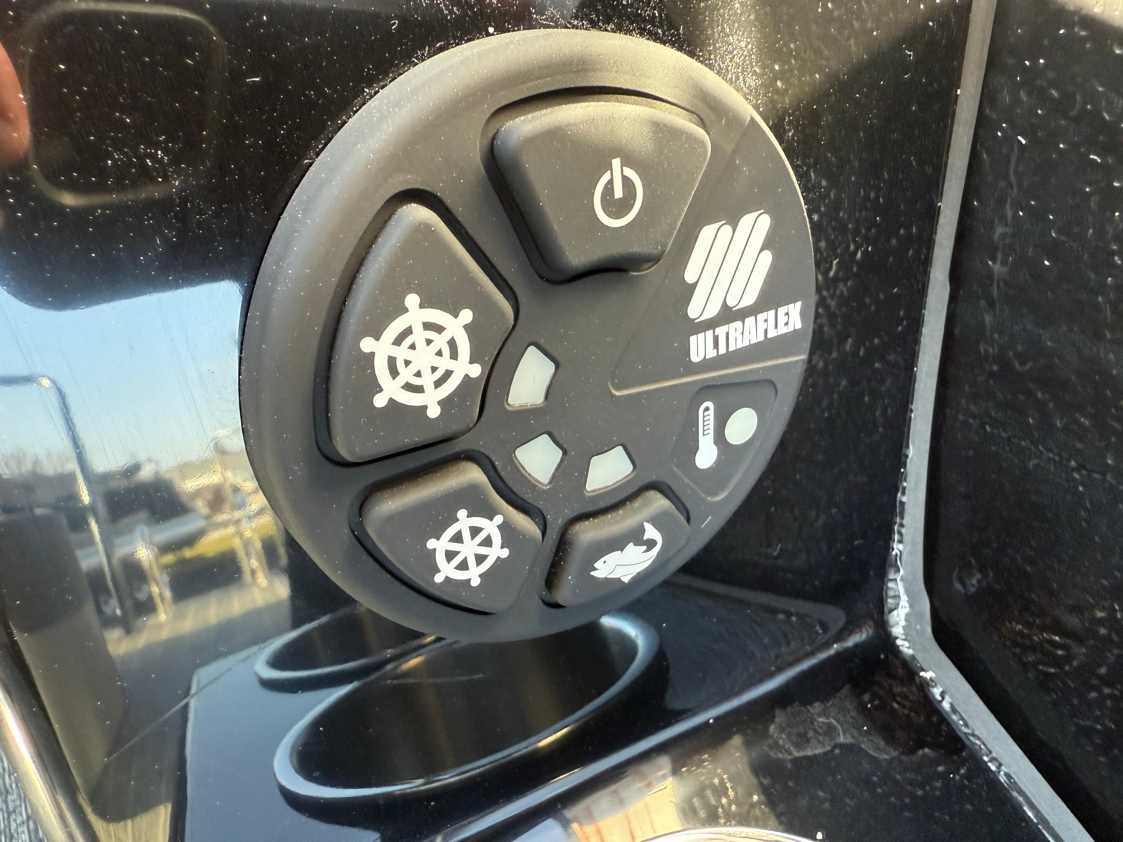 Control panel of 2025 Premier 230 Solaris RL boat with Ultraflex buttons.