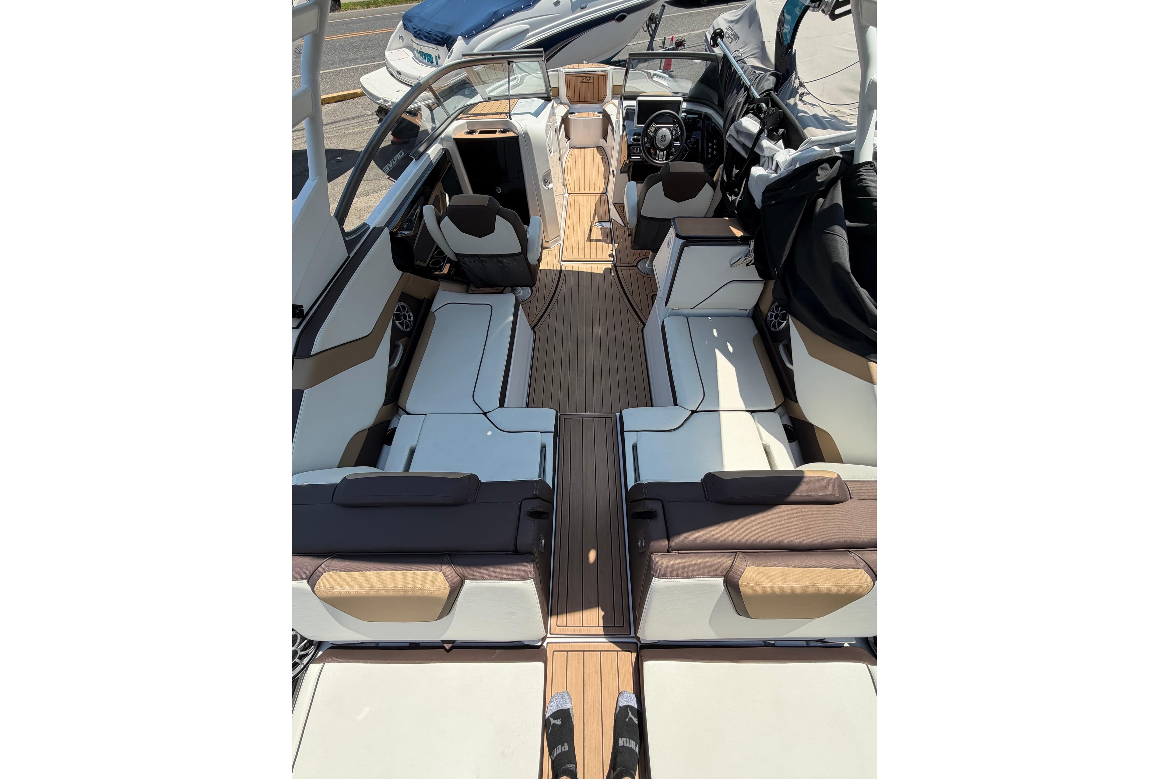 2022 Yamaha Boats 252SD interior with luxurious seating and modern design.