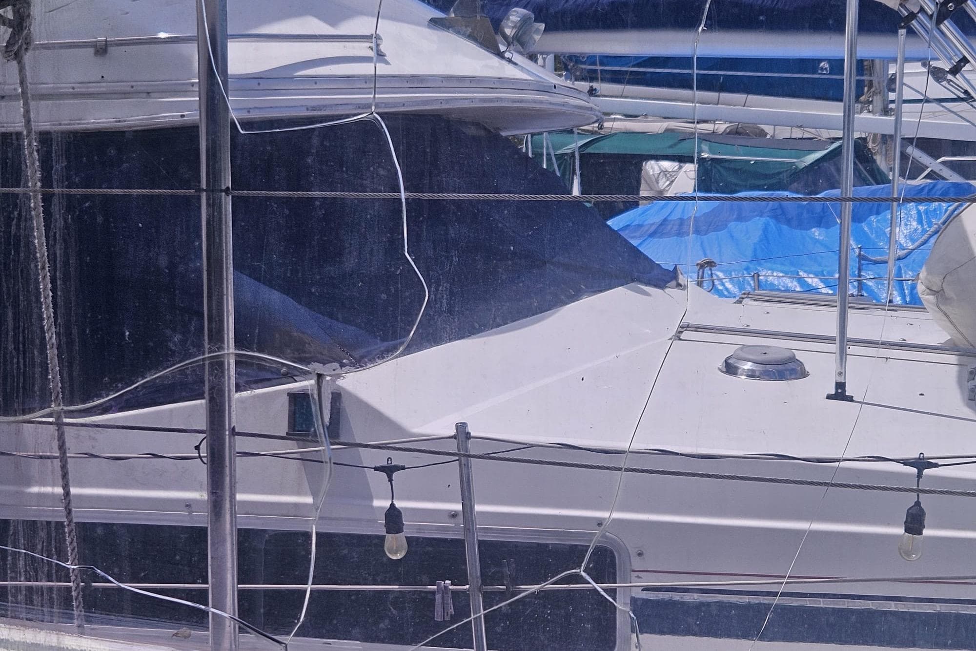 1977 Chris-Craft 52 Constellation yacht docked, featuring sleek design and nautical equipment.