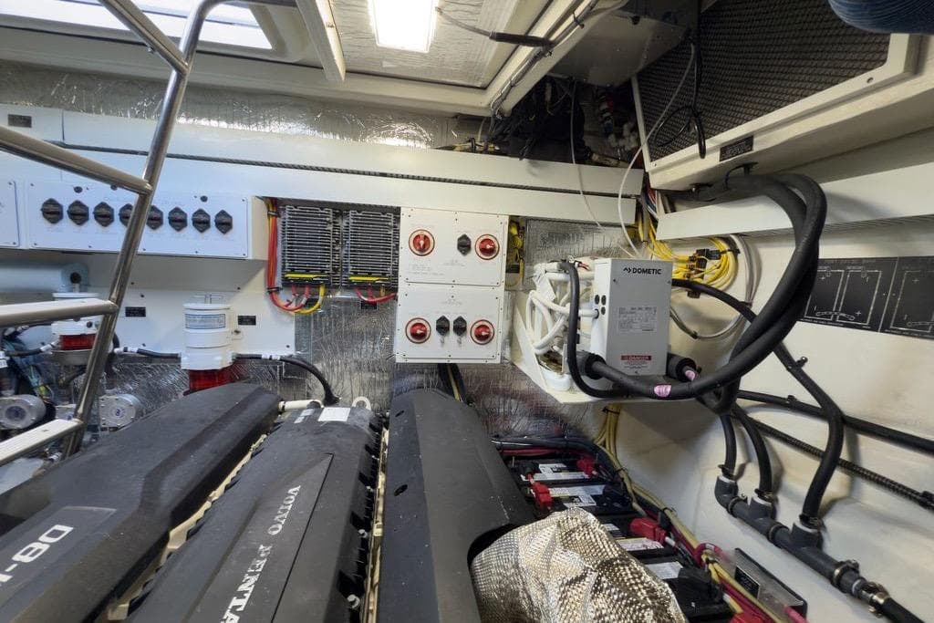 Engine room of 2020 Cruisers Yachts 50 Cantius with Volvo Penta engines and electrical systems.