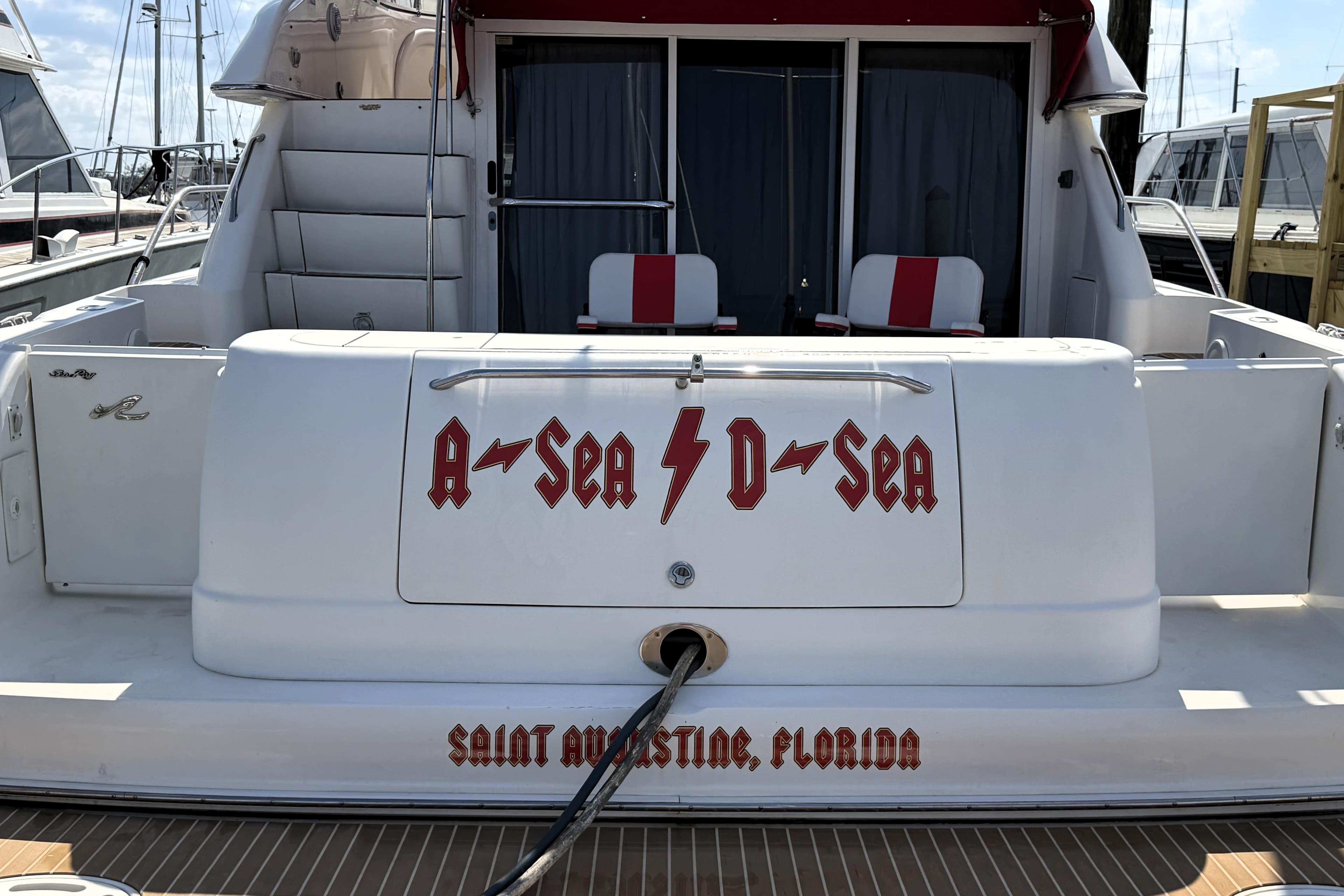 Sea Ray 450 Express Bridge 2000 yacht docked, featuring custom name "A-Sea D-Sea," Saint Augustine, Florida.
