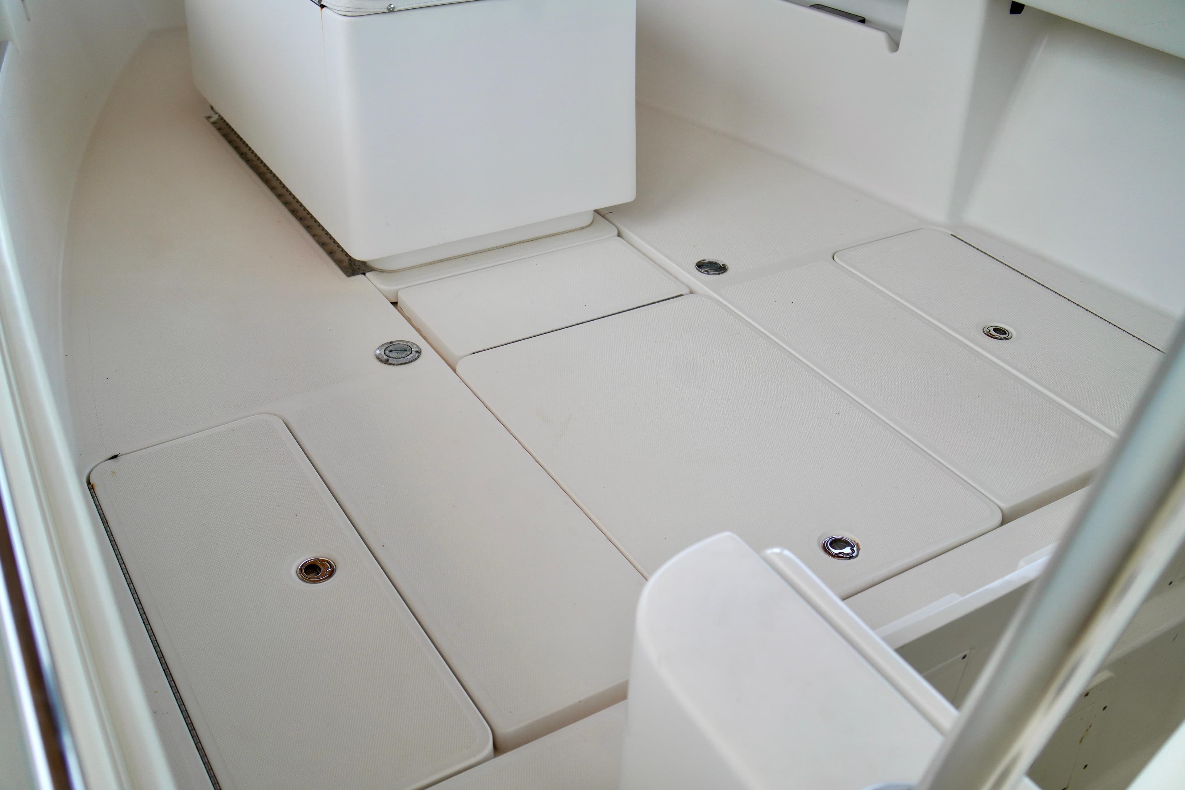 2019 Invincible 36 Open Fisherman boat deck with storage compartments.