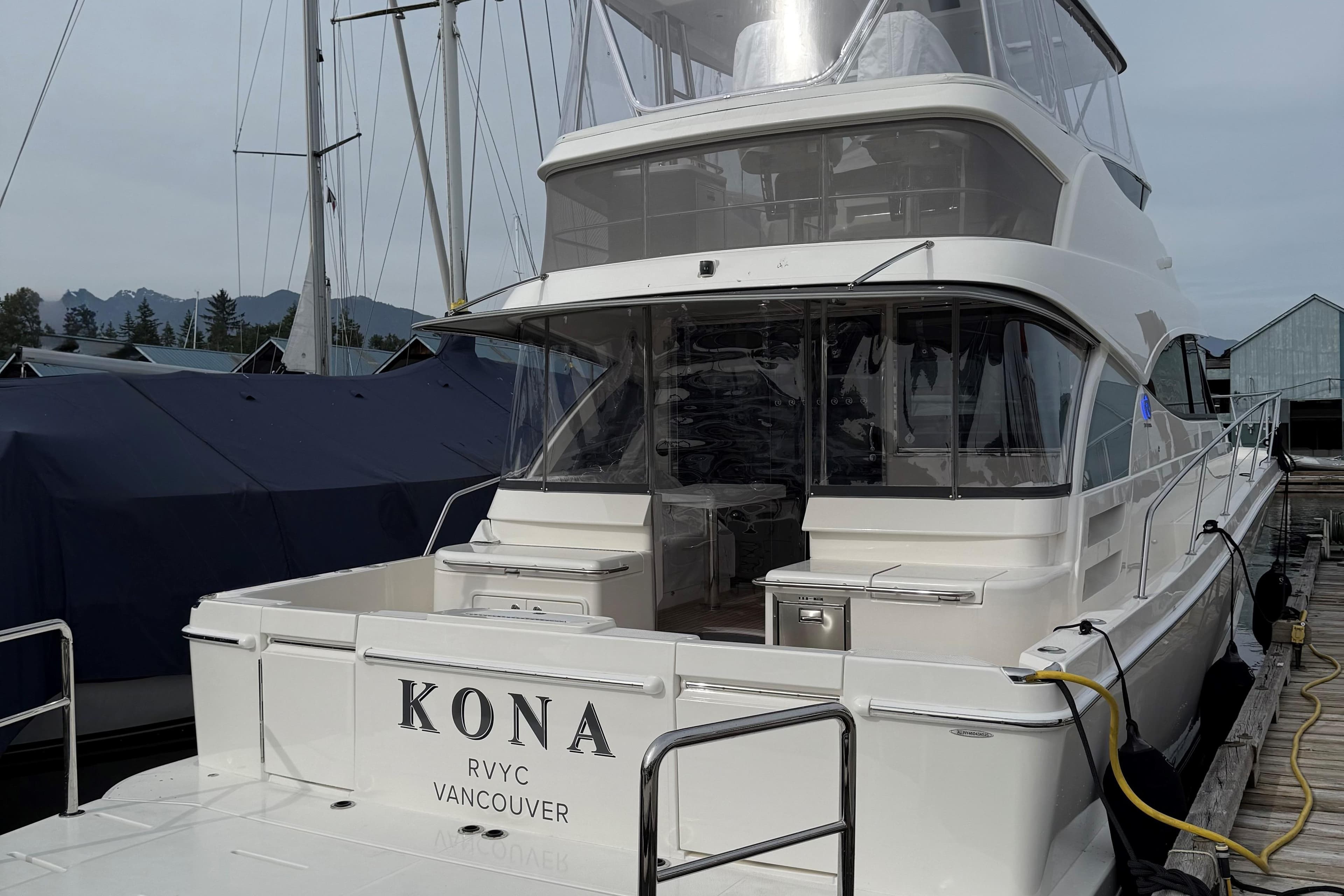 2025 Riviera 46 Sports Motor Yacht docked in Vancouver marina.