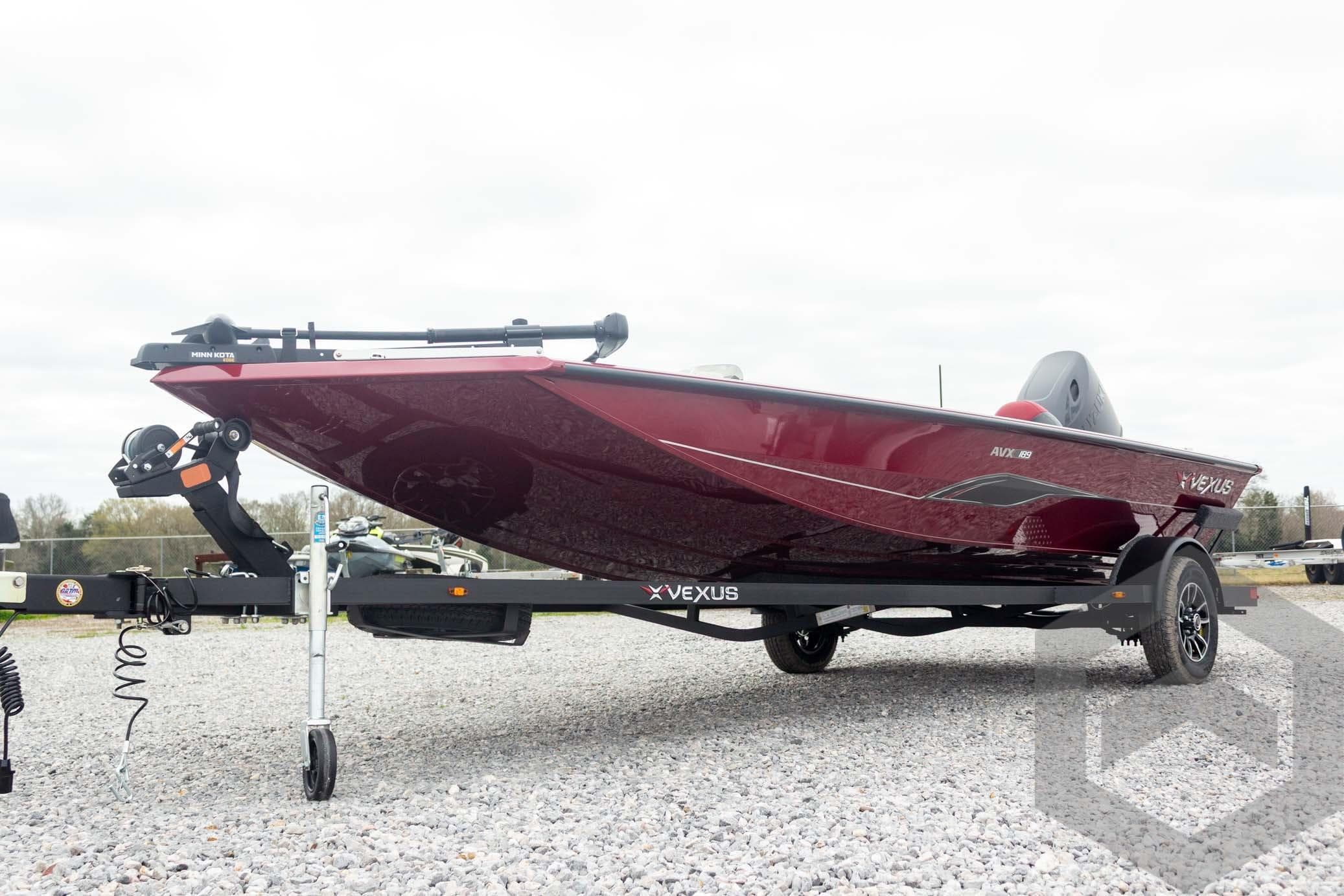 2026 Vexus Defender 189 boat on trailer, displayed outdoors on gravel.