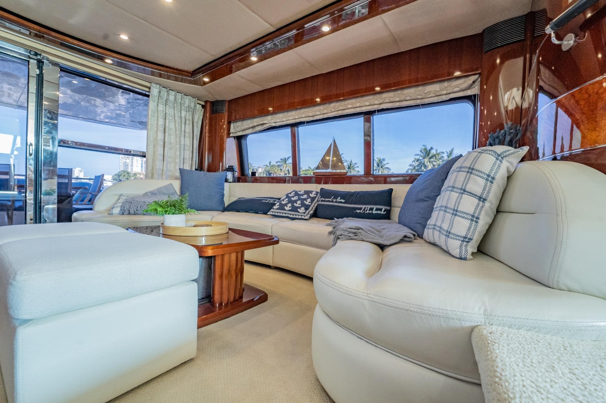 Luxurious 2004 Viking Princess Flybridge yacht interior with plush seating and elegant decor.