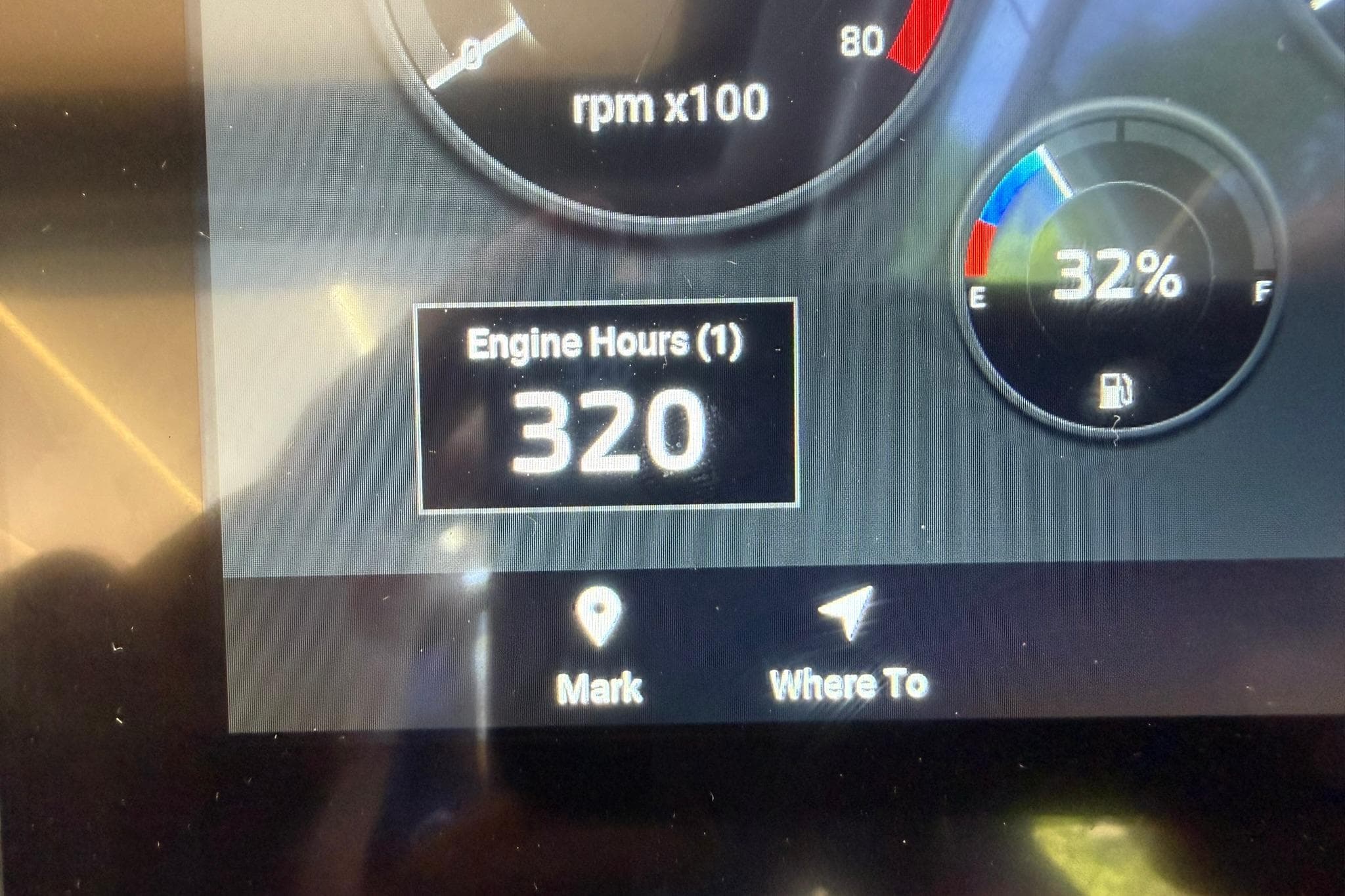 Dashboard of 2024 Hanover 387 showing 320 engine hours and 32% fuel level.