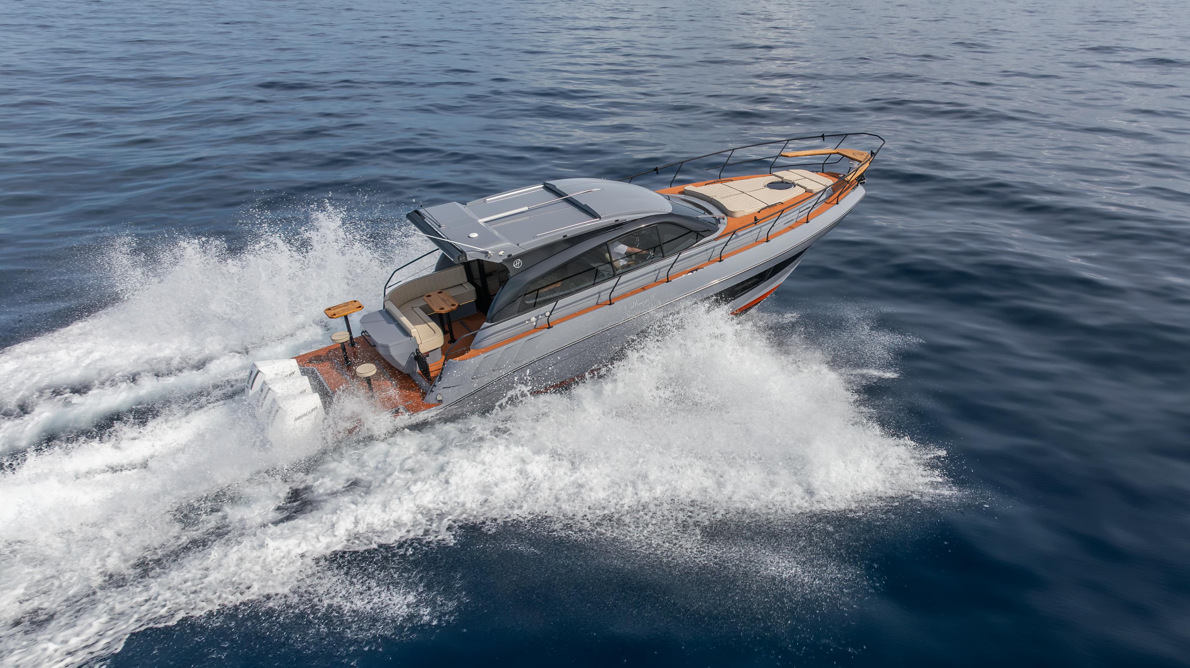 2025 Hanover 415 luxury yacht cruising on open water.
