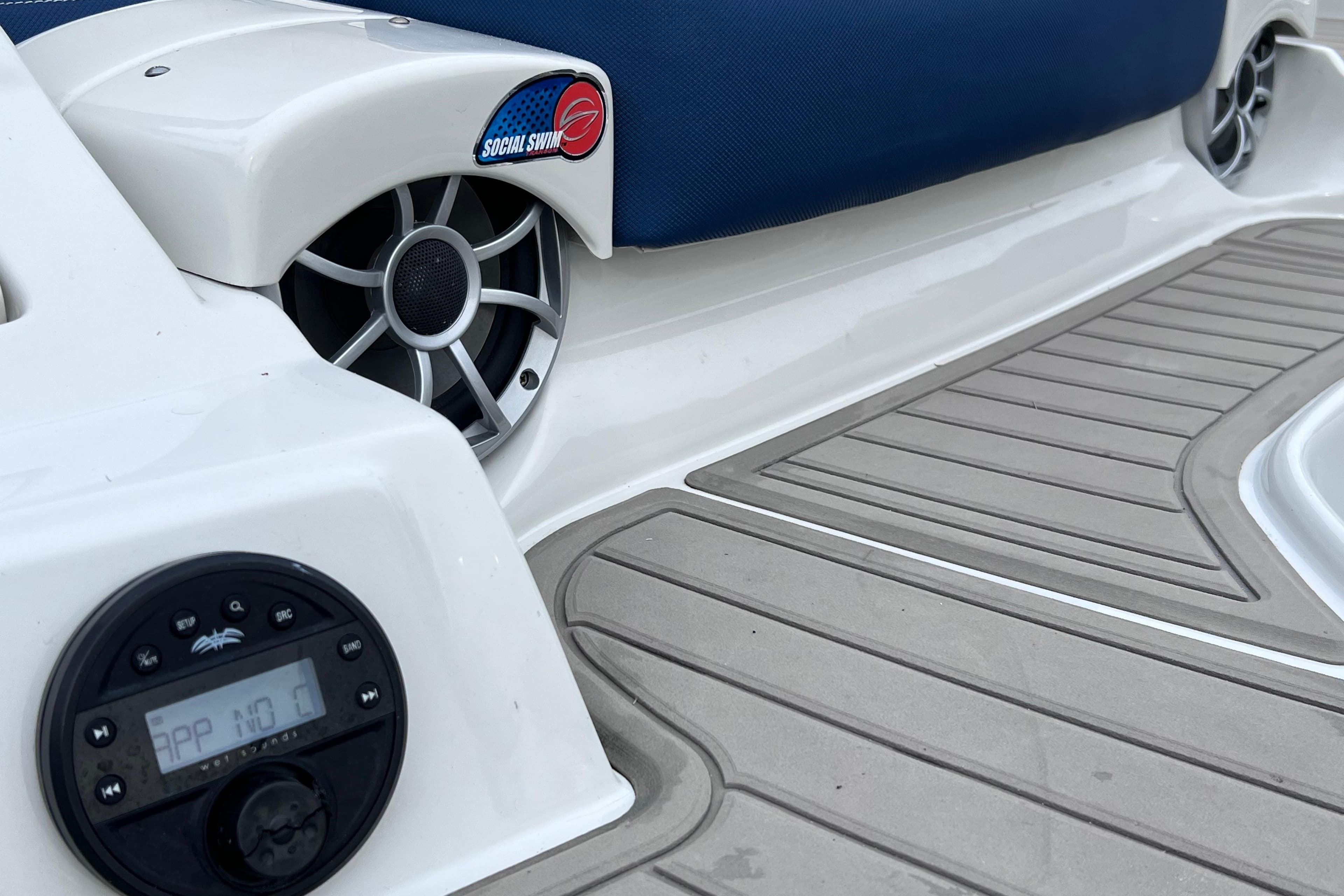2022 Crownline 290 XSS boat deck with speakers and control panel.