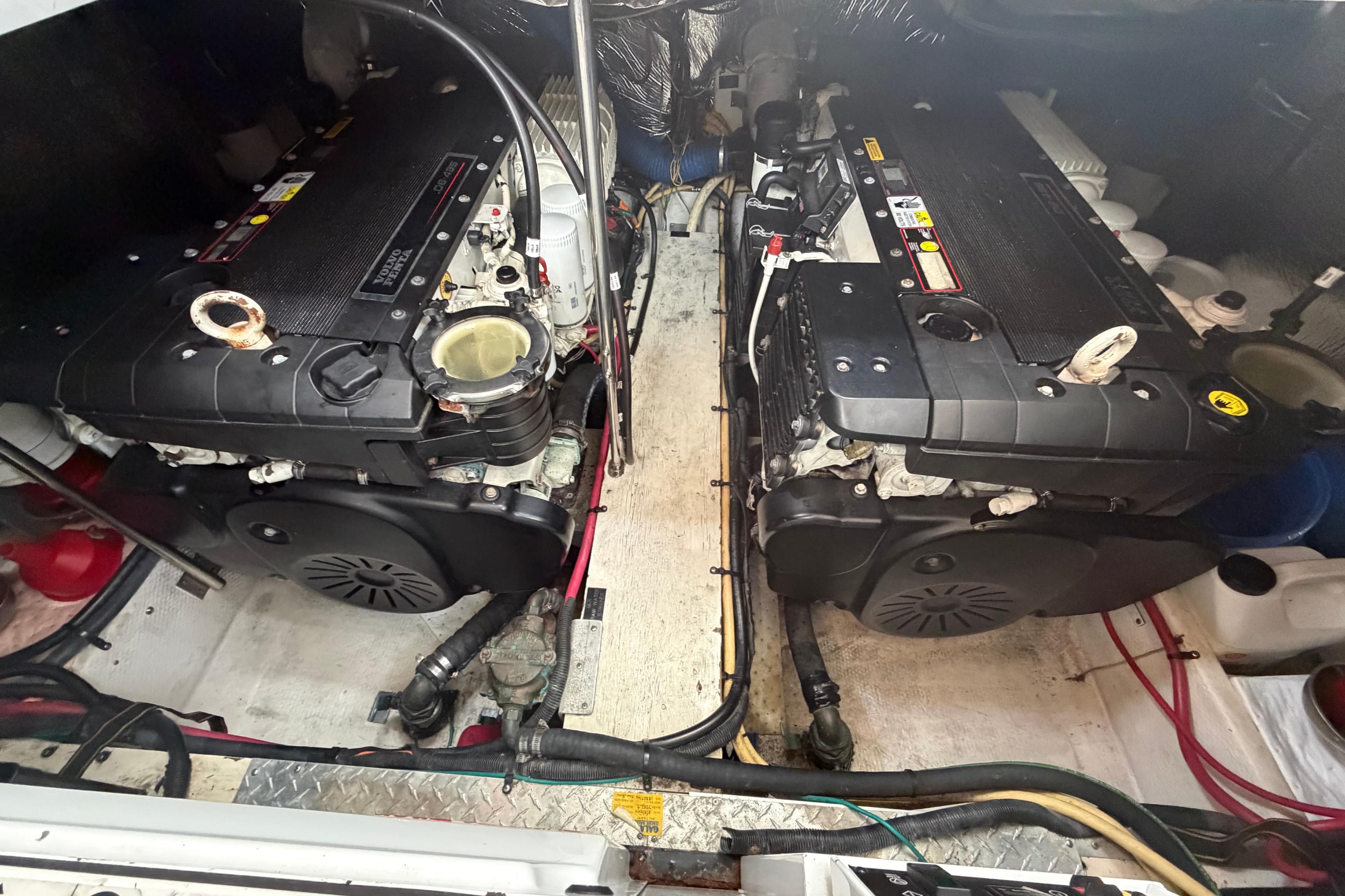 Engine room of 2011 Cruisers Yachts 415 Express Motoryacht with twin diesel engines.