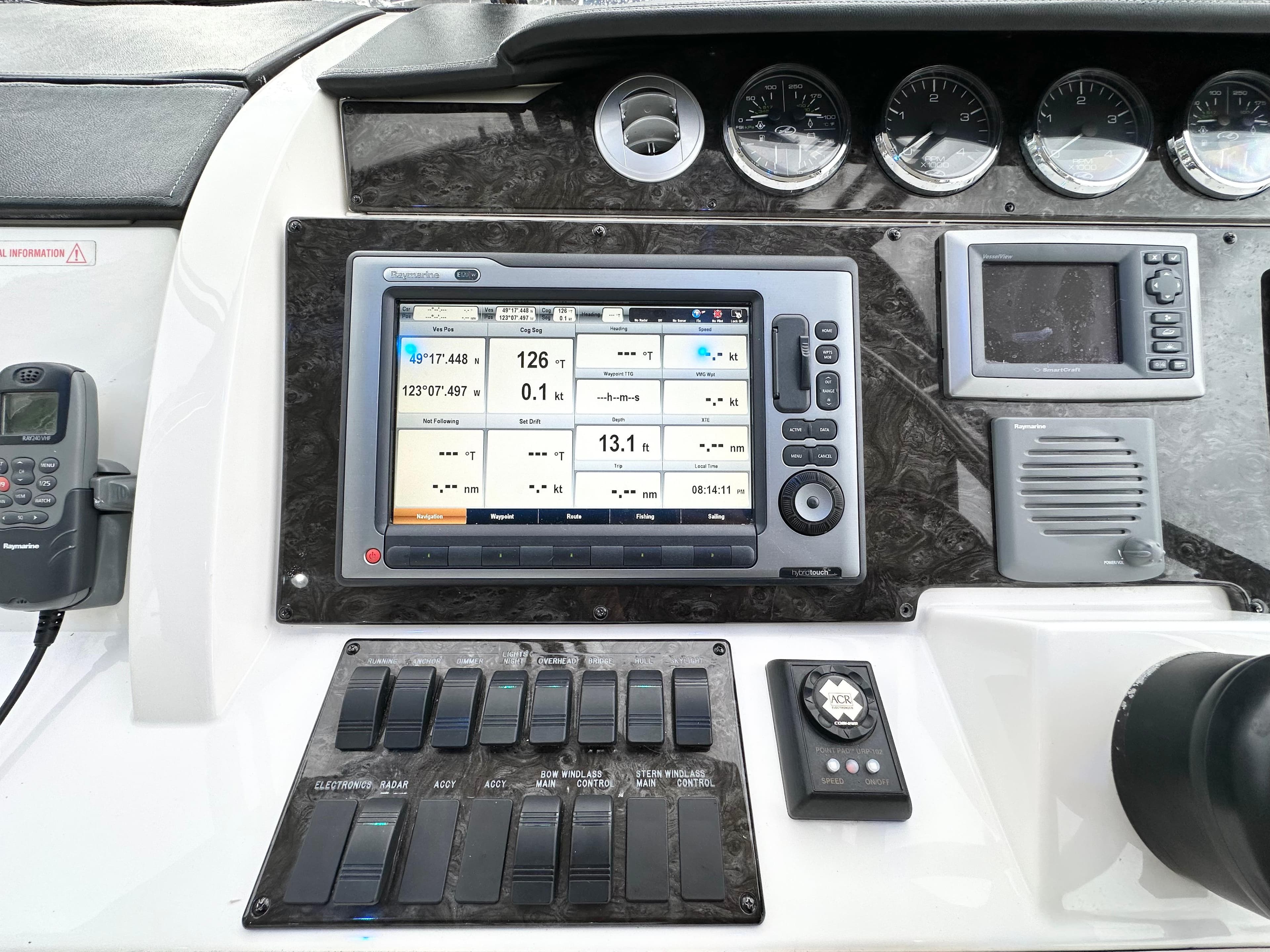 Dashboard of 2012 Sea Ray 450 Sedan Bridge with navigation system.