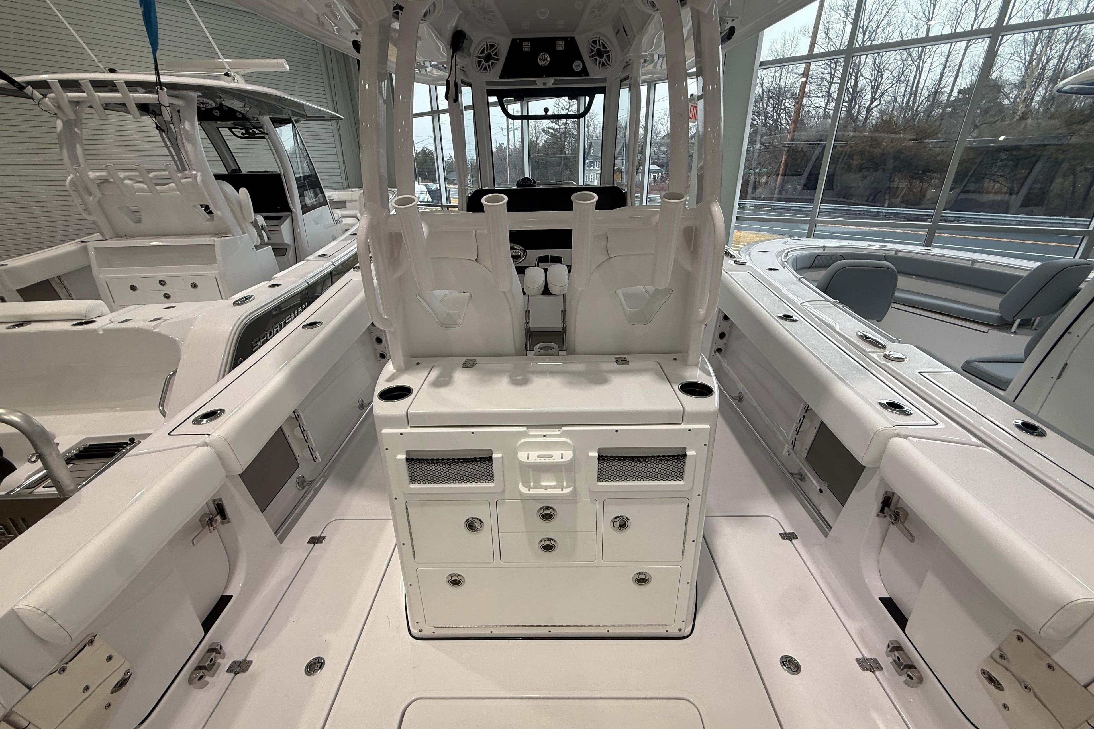 2026 Sportsman Open 282 Center Console boat interior with seating and storage compartments.