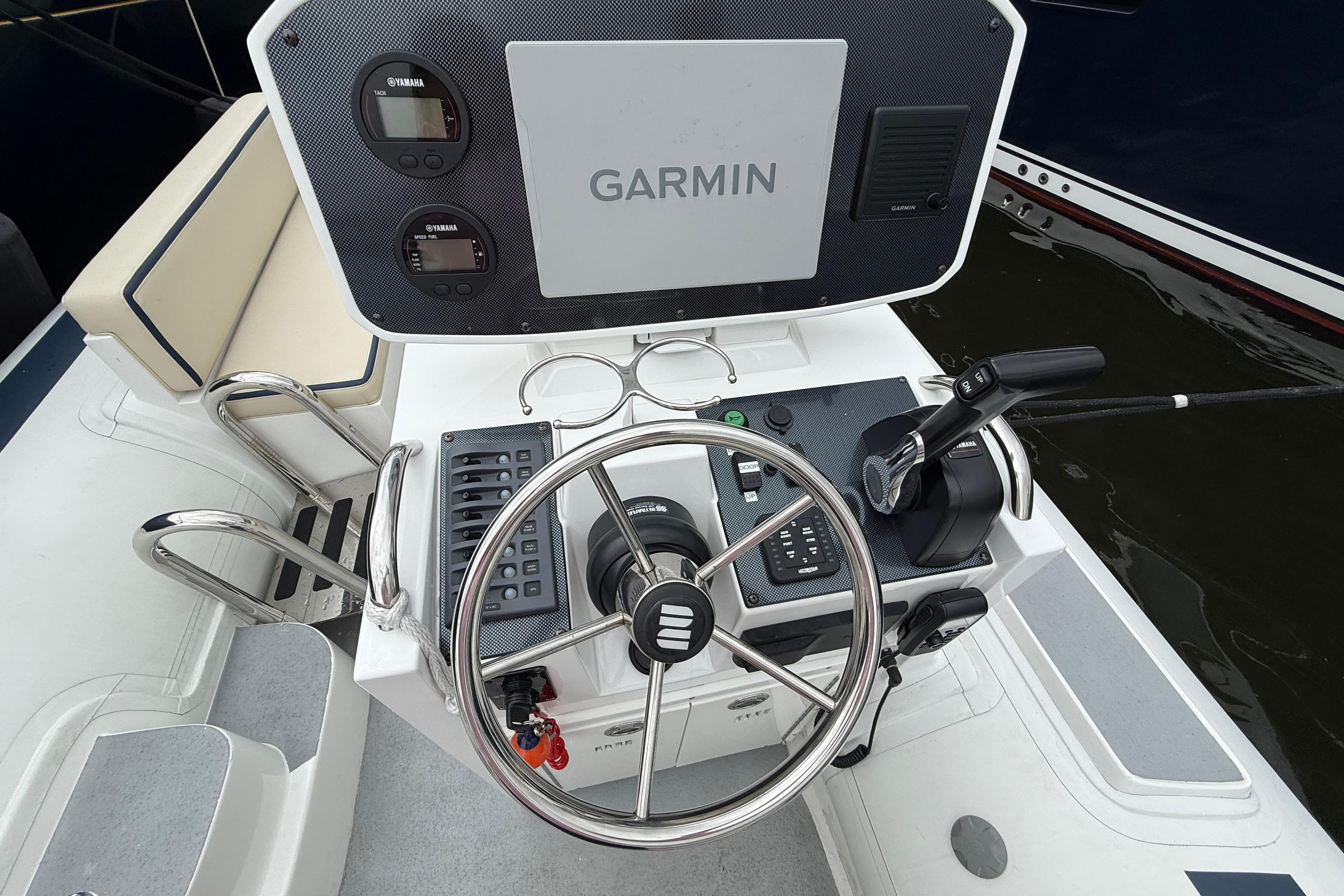 2024 Novurania Catamaran 20 helm with Garmin navigation and Yamaha controls.