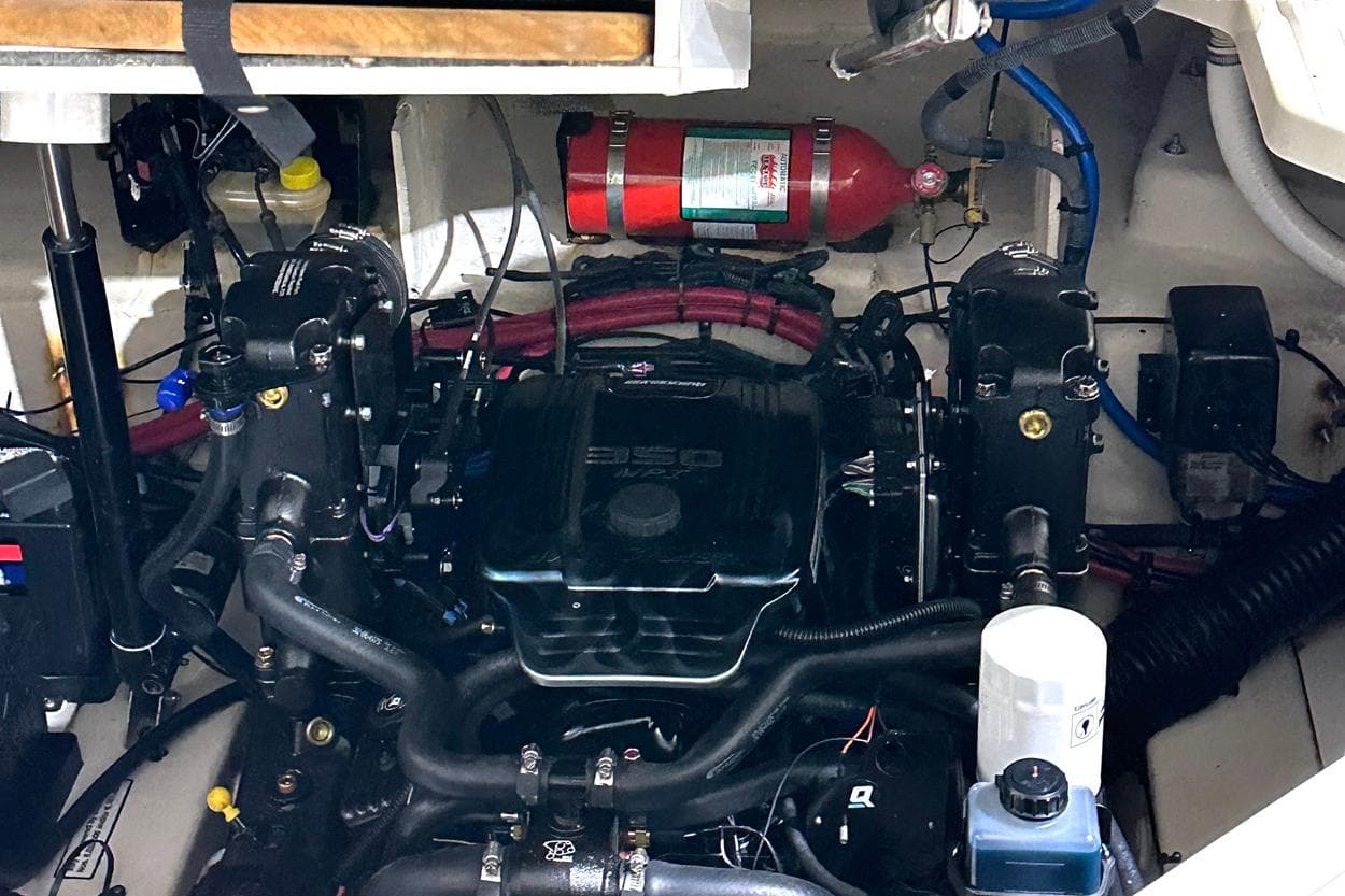 Engine compartment of a 2007 Sea Ray Sundancer 260 boat, featuring a 350 engine.