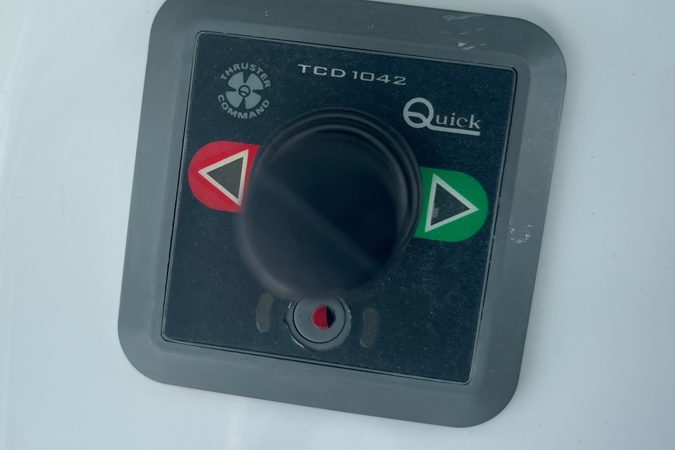 Control panel of a 2020 Jupiter 38 boat with thruster command joystick.