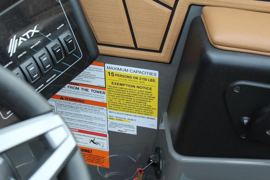 Control panel and capacity warning on 2024 ATX Surf Boats 22 Type-S dashboard.