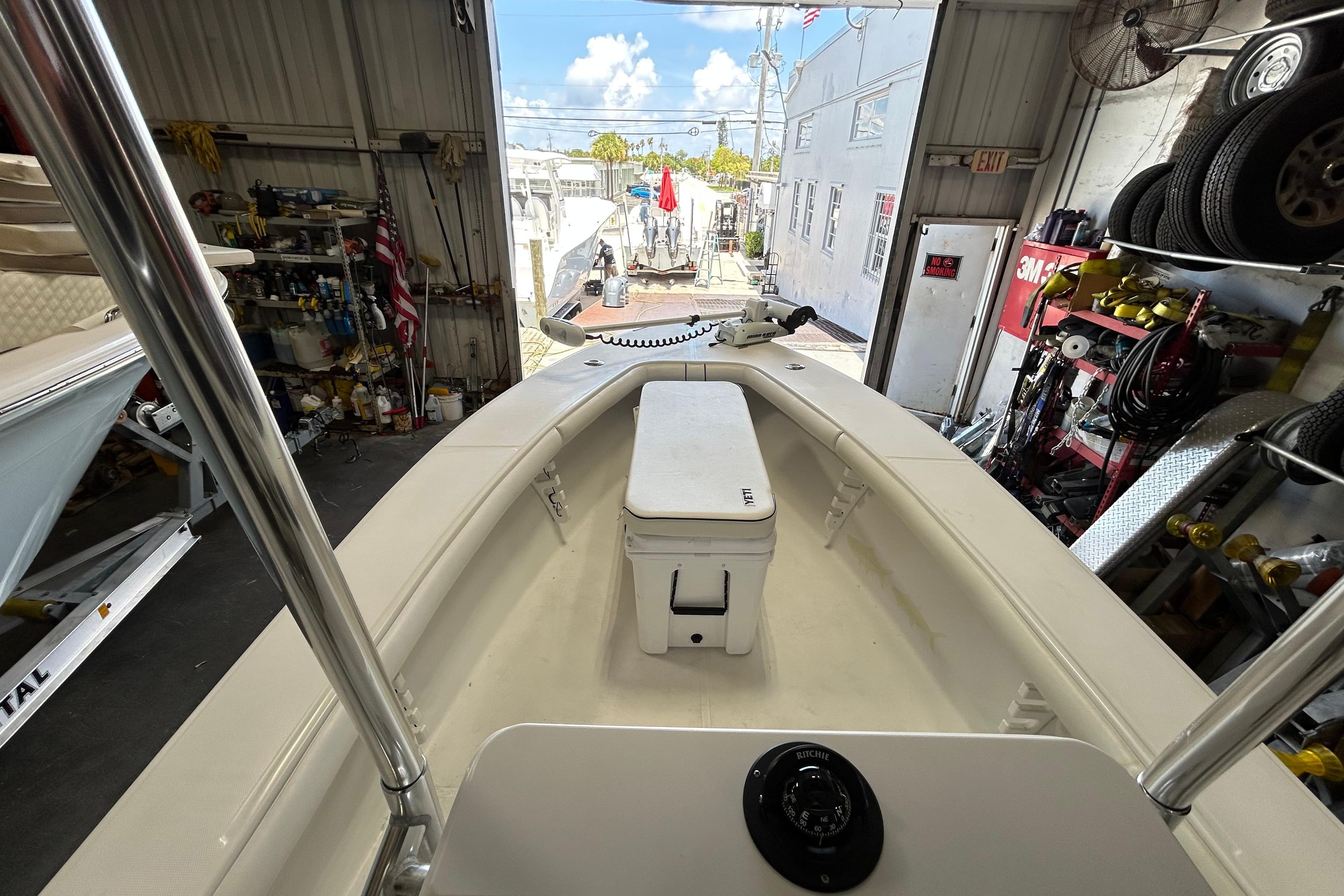 2005 SeaCraft SC 23 Classic boat interior in a workshop setting.