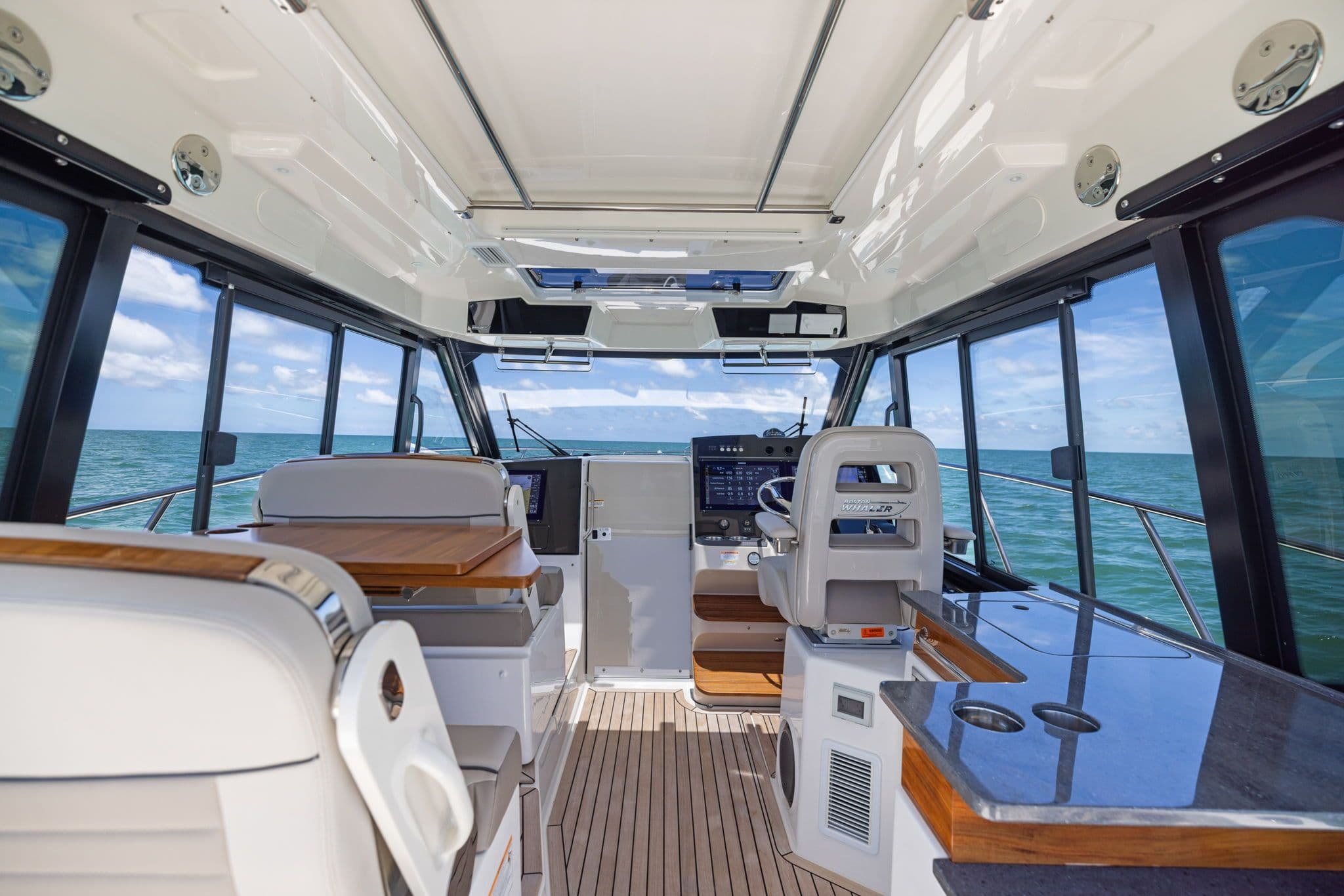 Interior of 2025 Boston Whaler 365 Conquest on open sea.