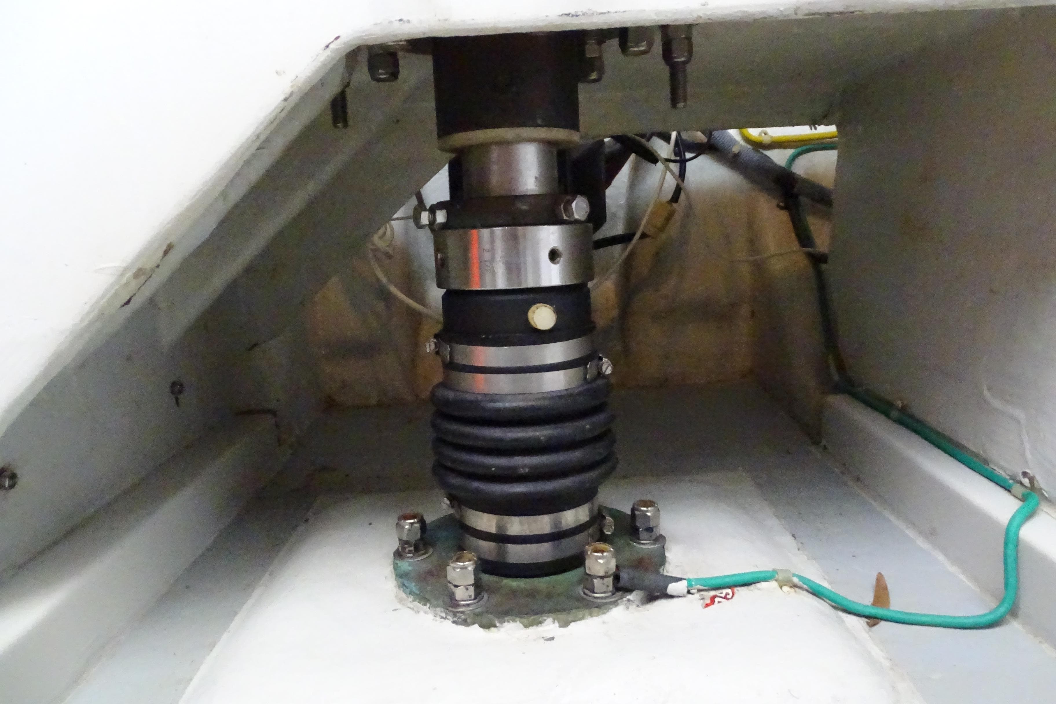 Engine compartment of a 2004 Selene 53 yacht, featuring mechanical components and wiring.