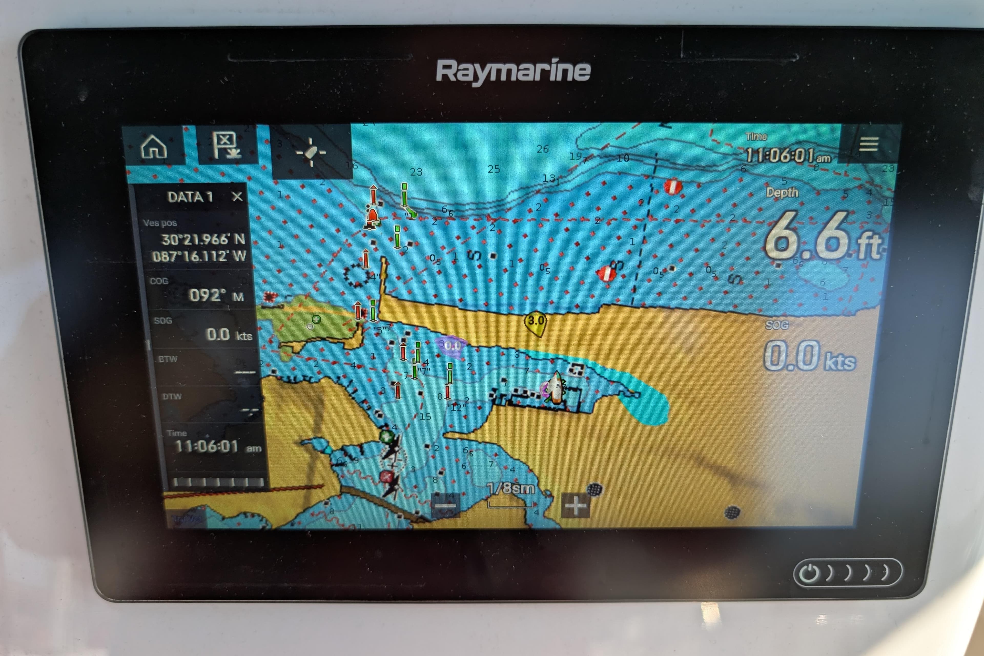 Raymarine navigation display on 1999 Island Packet 320, showing nautical chart and depth of 6.6 feet.