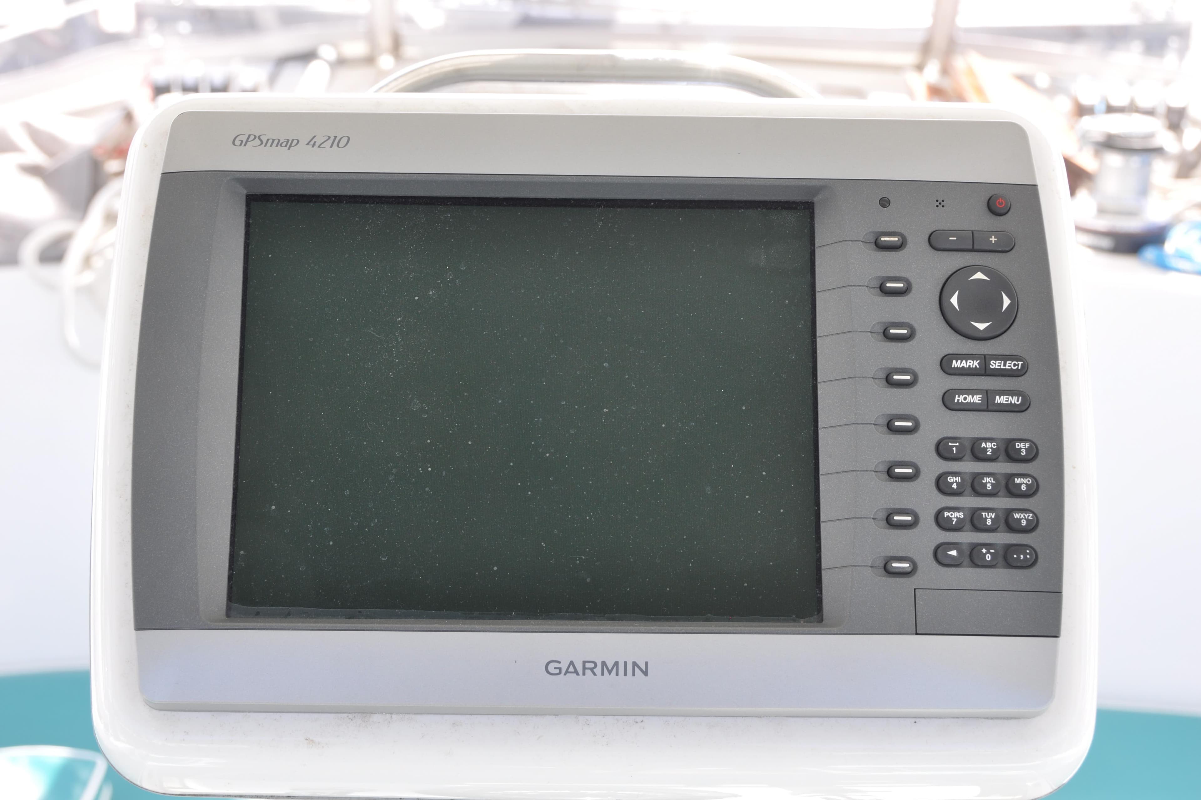 Garmin GPSmap 4210 on Catalina 387 yacht, 2003 model, with navigation controls.