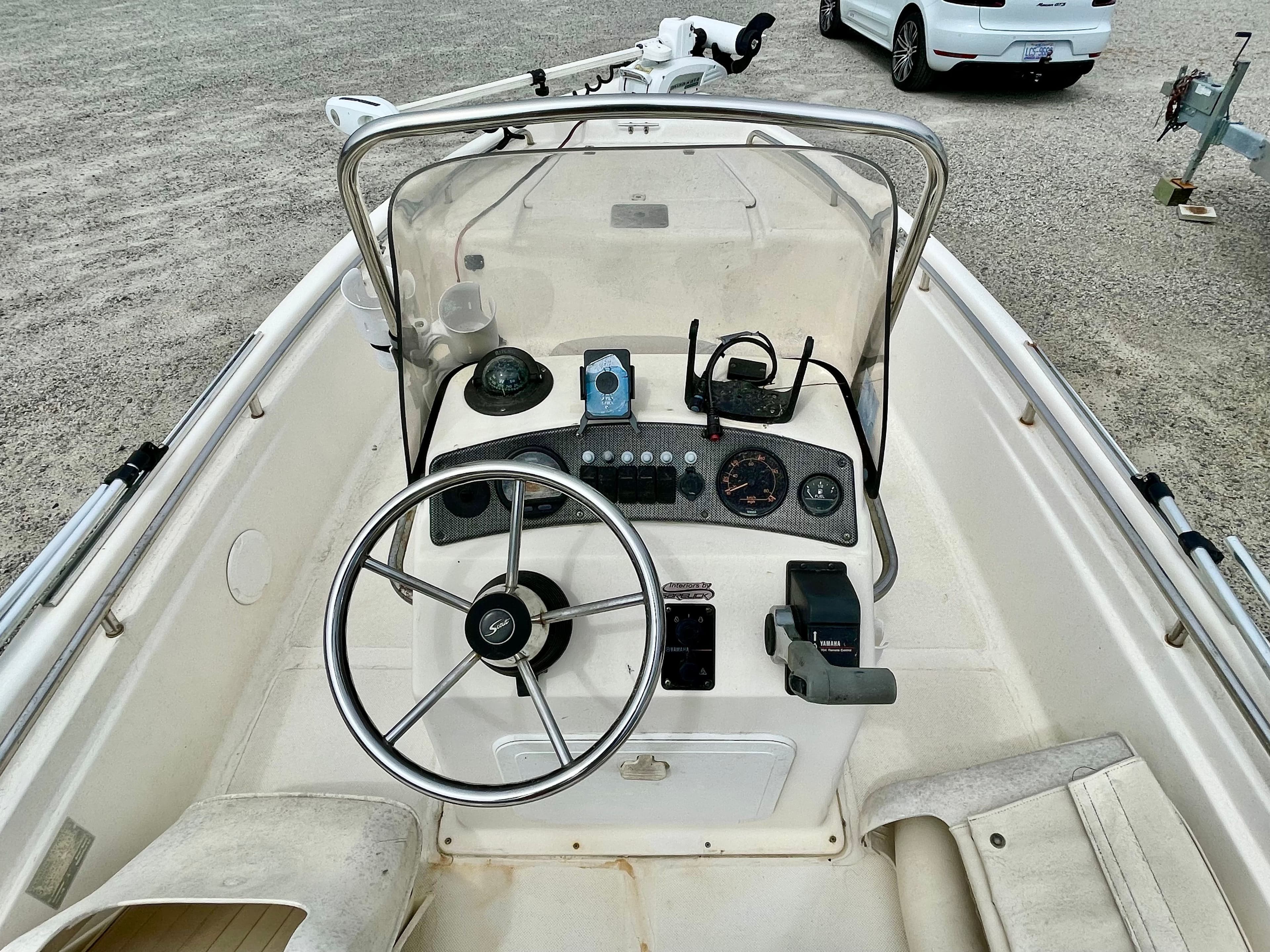 2004 Scout Sportfish 160 helm with steering wheel and instruments.