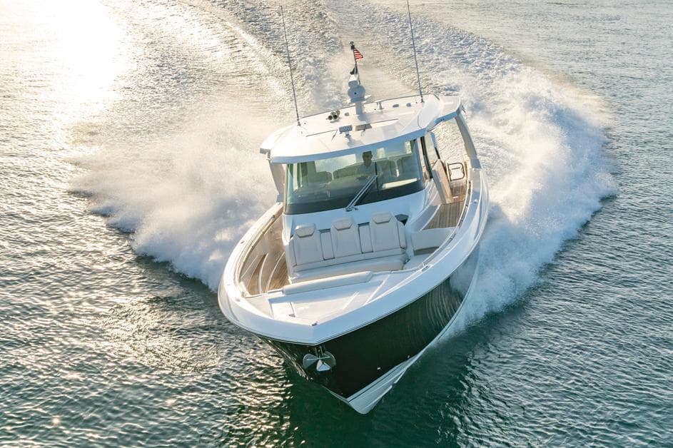 Manufacturer Provided Image: 2025 Tiara Yachts 48 LS cruising on open water, showcasing sleek design and powerful performance.