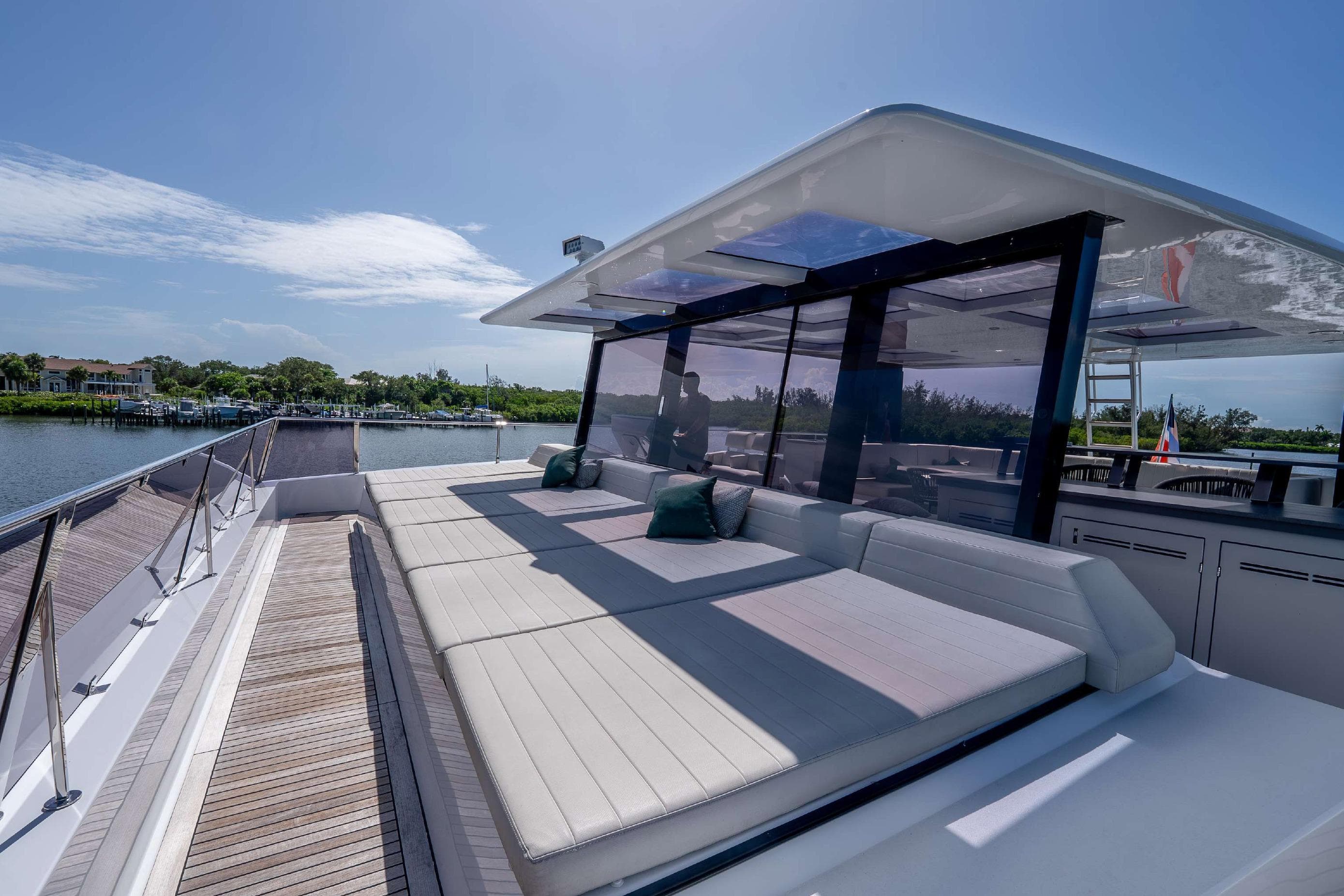 Luxurious Sunreef Supreme 68 Power yacht deck with spacious seating, 2021 model.