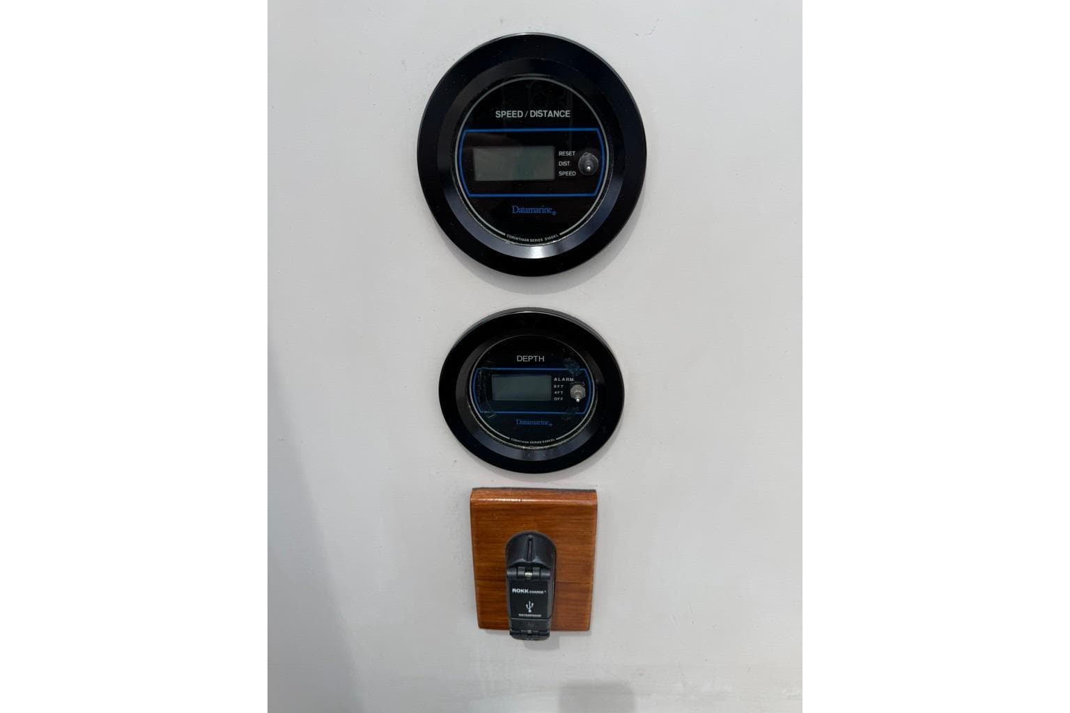 Instrumentation panel on a 1986 Nonsuch Ultra 30 sailboat, featuring speed and depth gauges.