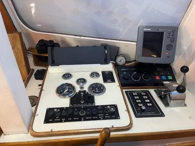 Control panel of a 1972 DeFever 38 Passagemaker with navigation instruments and gauges.