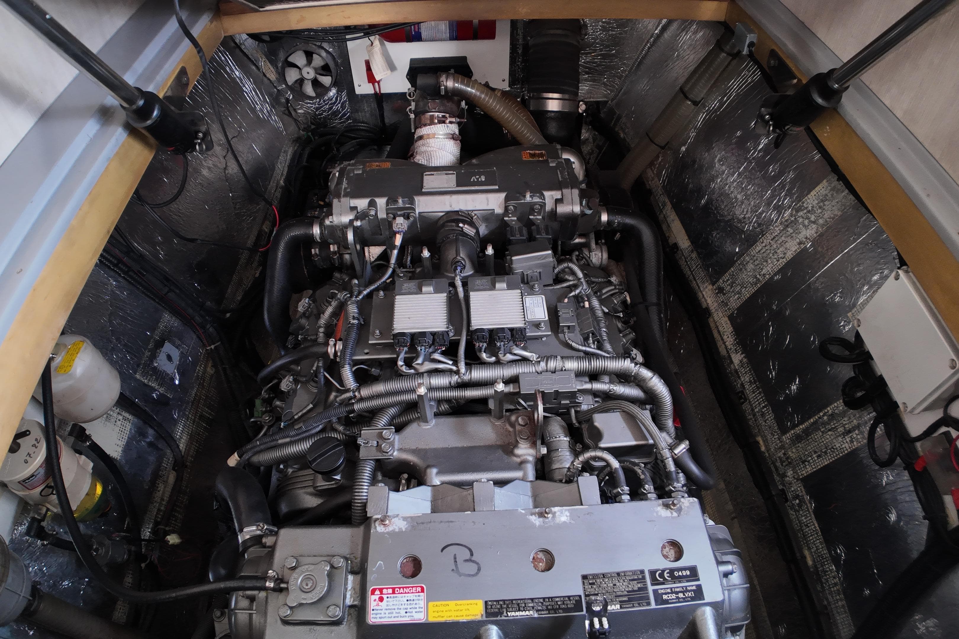 Engine compartment of a 2017 Leopard 51 Powercat, showcasing detailed mechanical components.