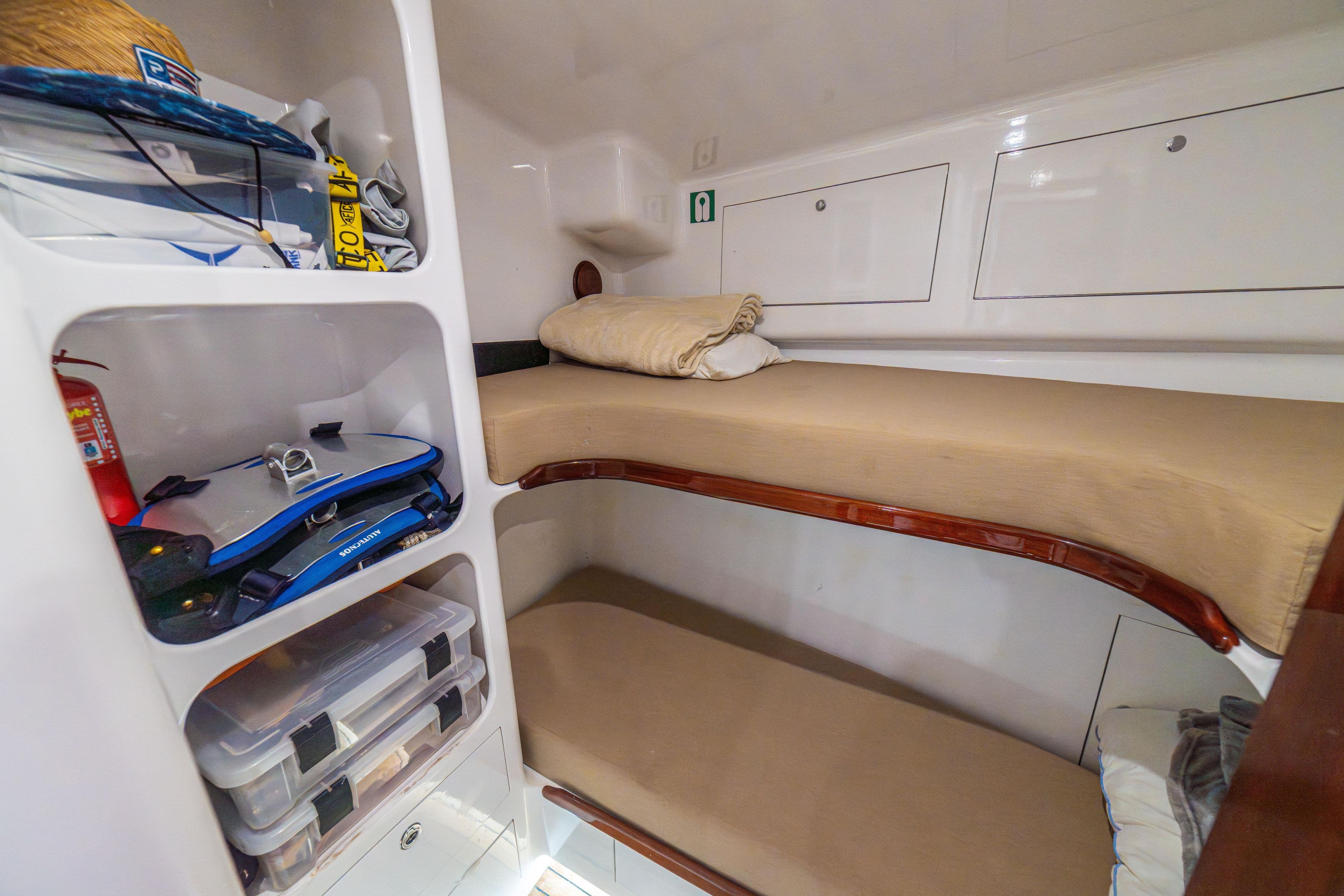 Cozy cabin interior of 2020 Maverick Yachts Costa Rica 50 Sportfish with bunk beds and storage.