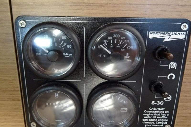 Control panel of a 2020 Lagoon 46 yacht with gauges and switches.