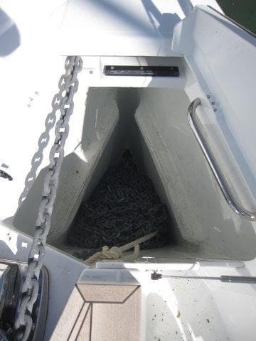 Anchor locker of 2025 Jeanneau Yacht 65 with chain and rope.