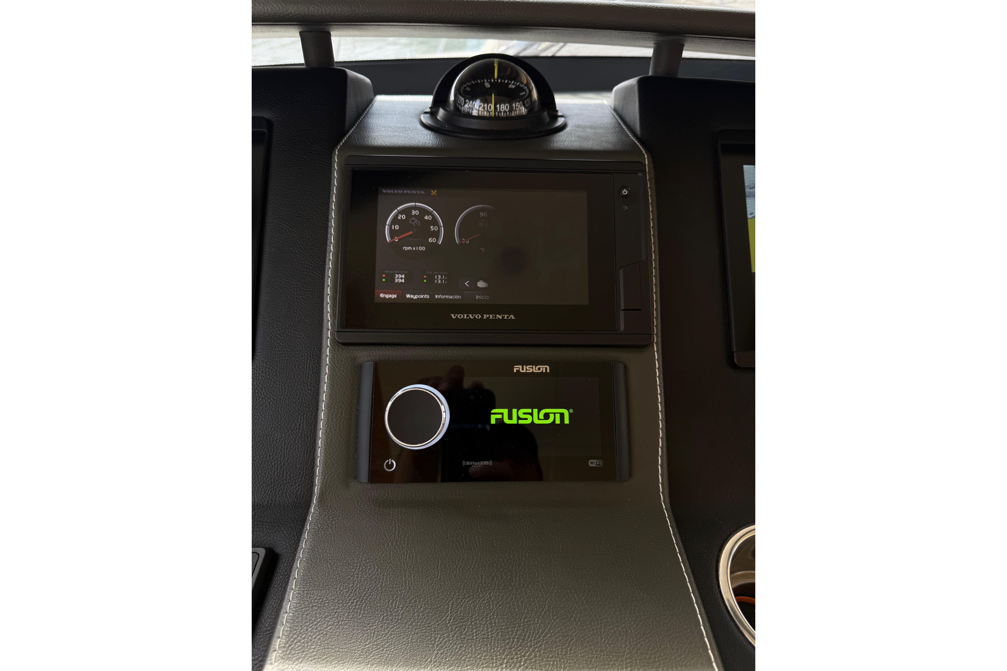 Dashboard of 2019 Riviera 39 Sports Motor Yacht with Volvo Penta and Fusion displays.