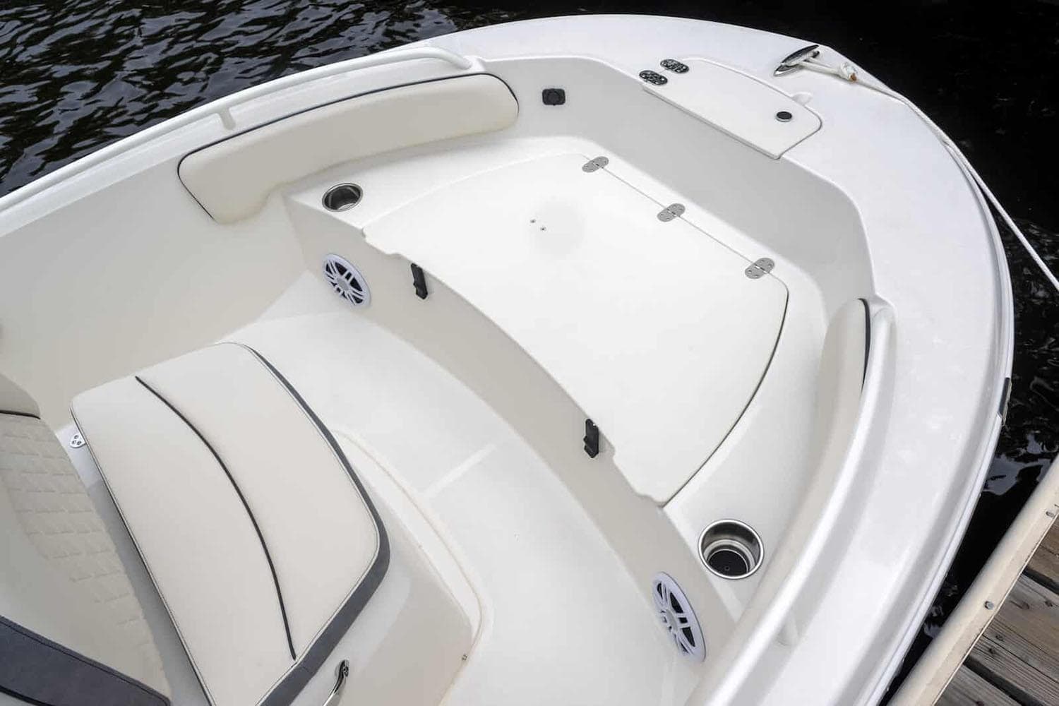 Manufacturer Provided Image: 2025 Stingray 173 CC boat interior with white seating and storage compartments.