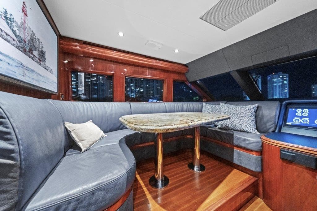 Luxurious 2006 Cheoy Lee Motor Yacht interior with elegant seating and modern design.